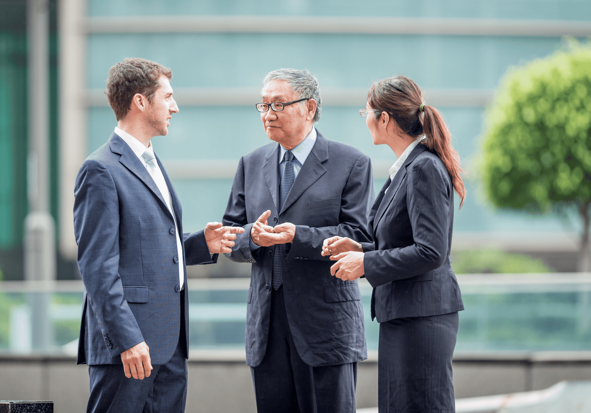 2 women sitting on black sofa