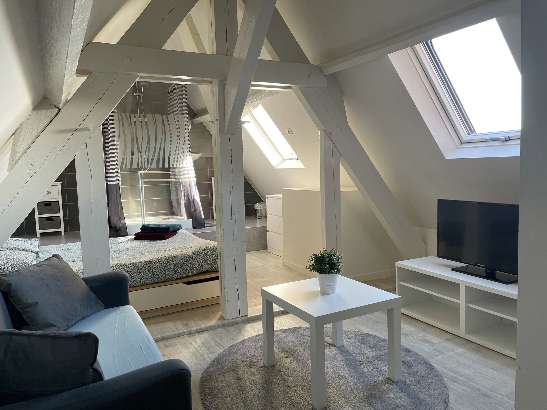 black and brown leather padded tub sofa