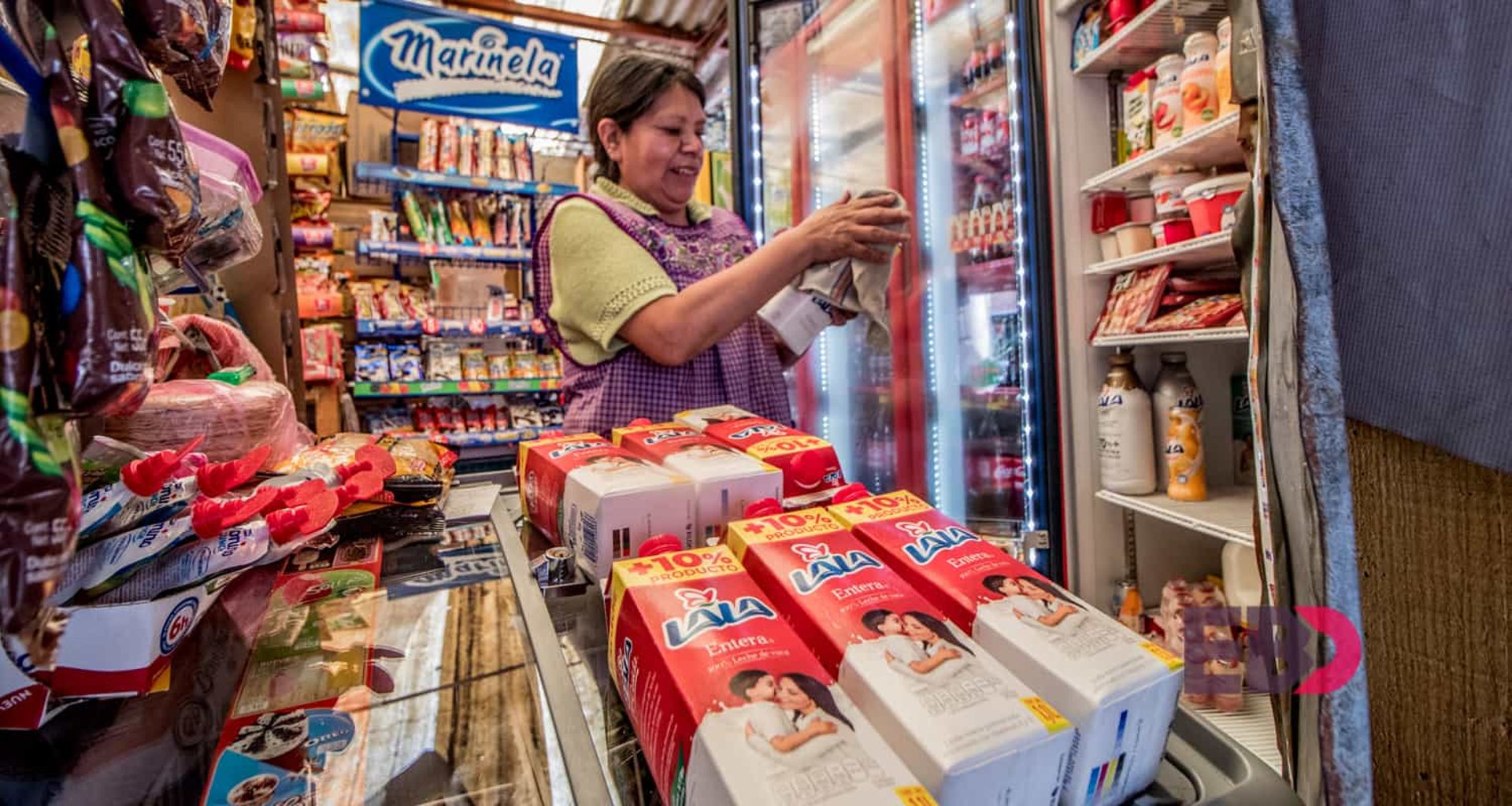 woman wearing yellow long-sleeved dress under white clouds and blue sky during daytime