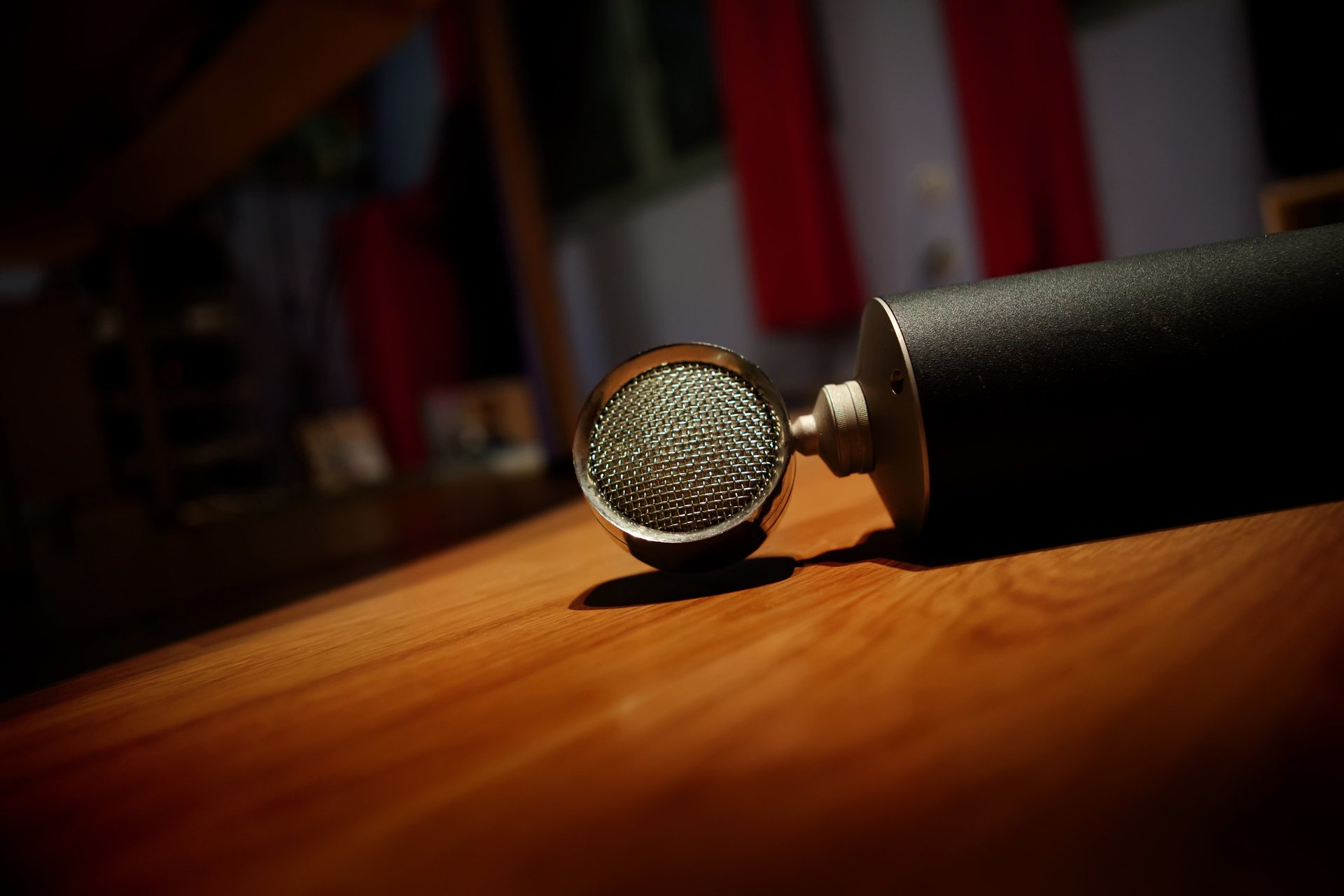 an abstract photo of a curved building with a blue sky in the background