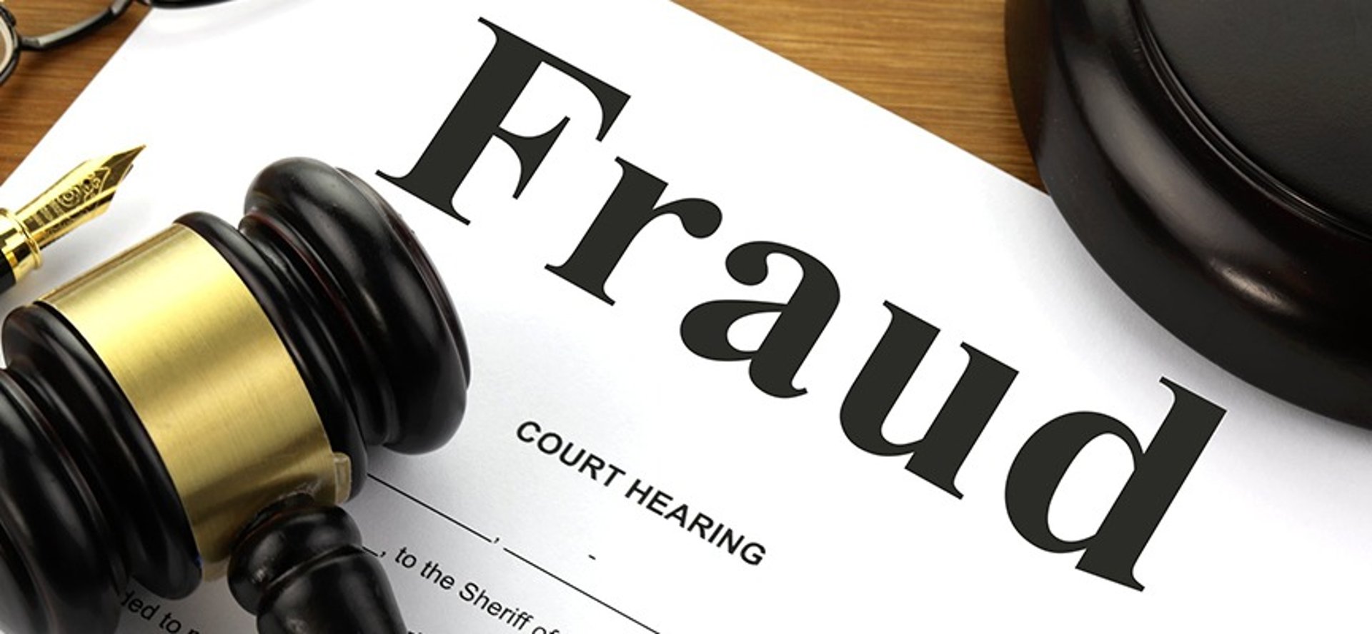 woman holding sword statue during daytime