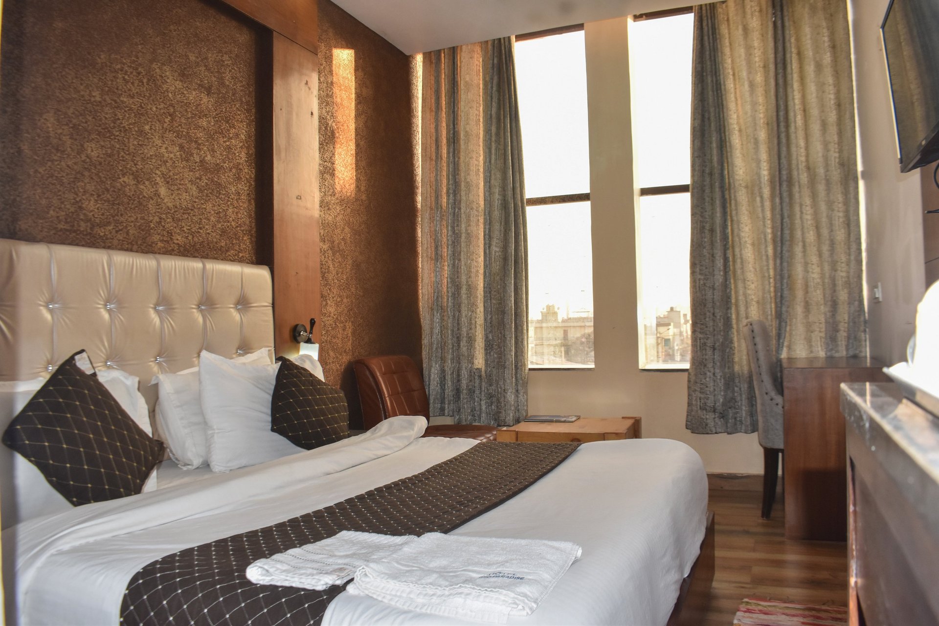 three clear glass chandeliers