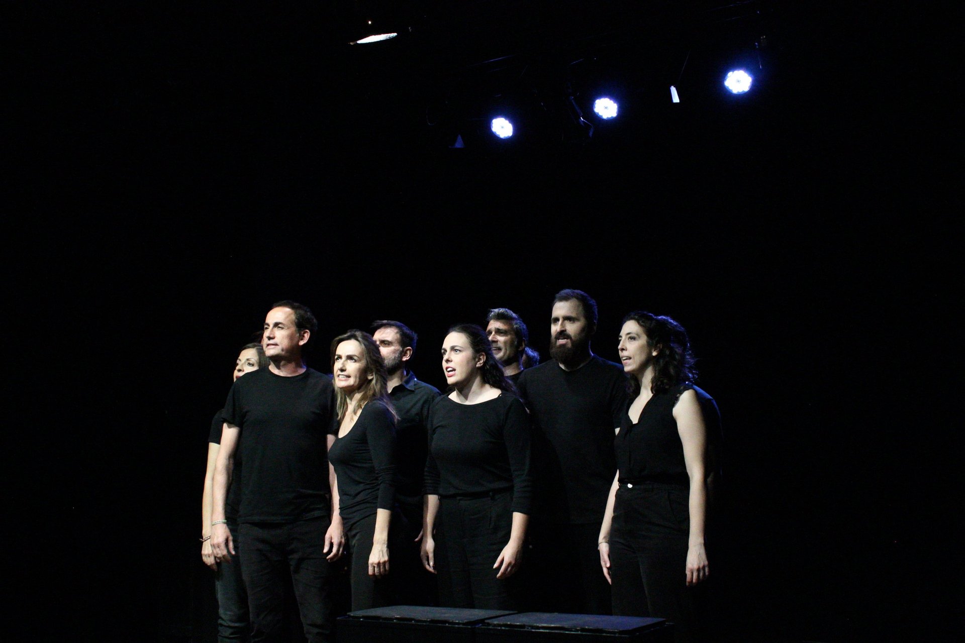 group of people performing on stage