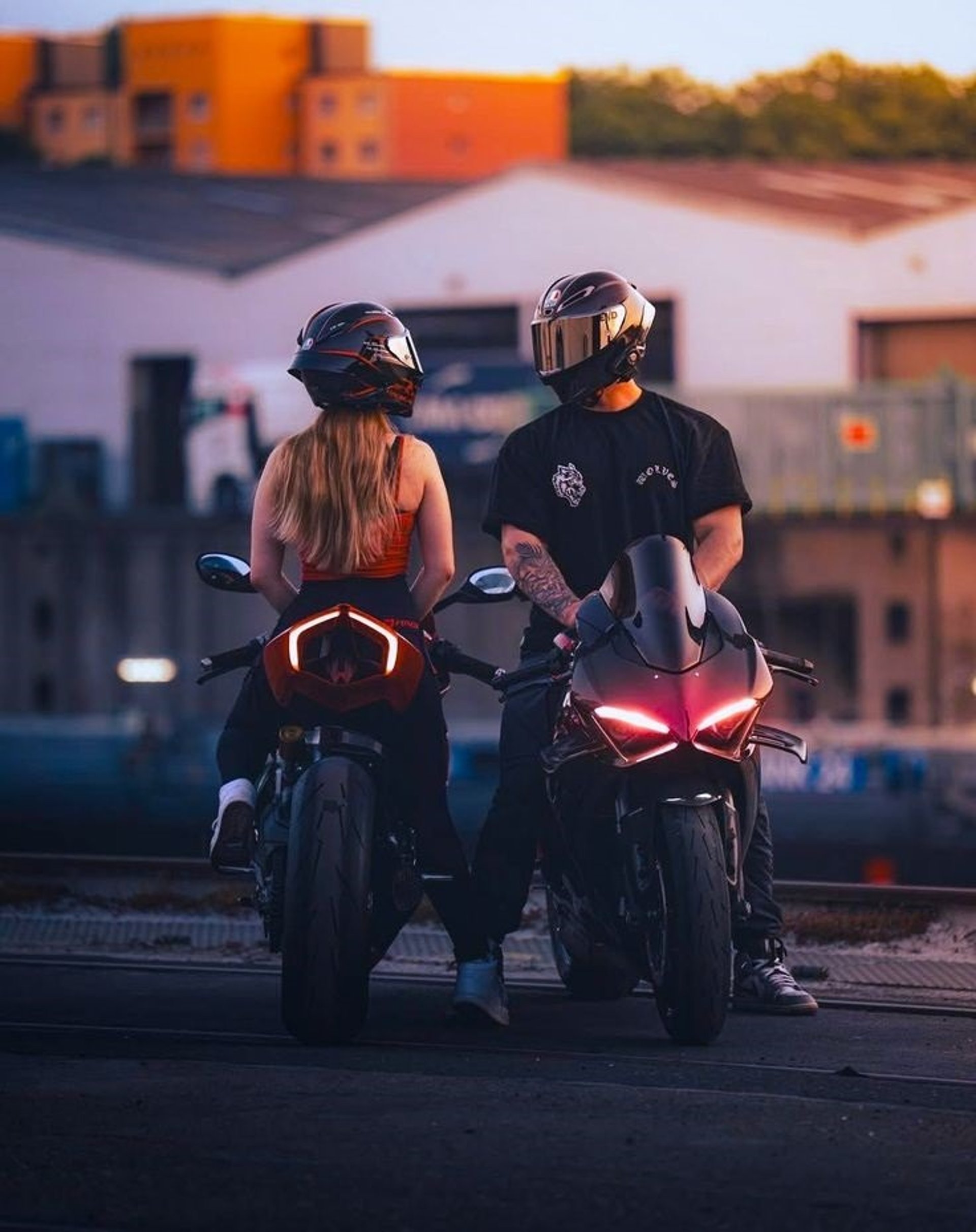 man in black and red jacket wearing black helmet