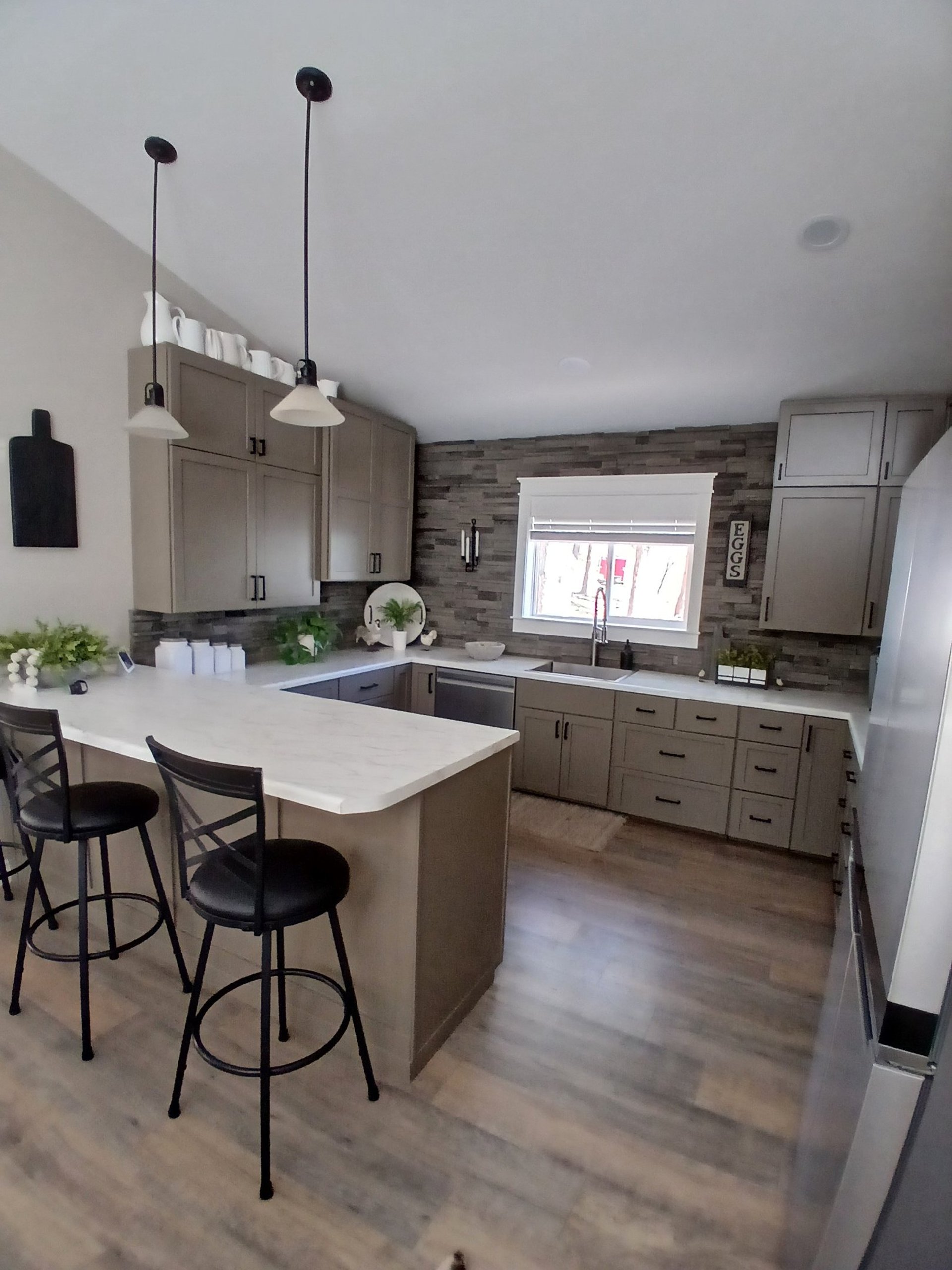 black and brown leather padded tub sofa