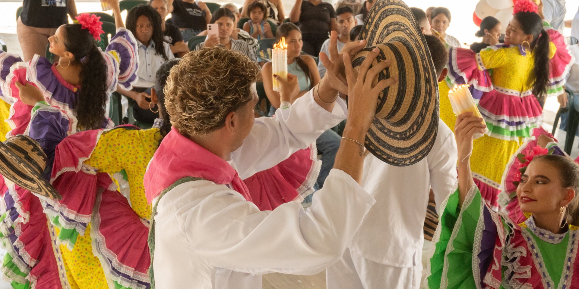 an abstract photo of a curved building with a blue sky in the background