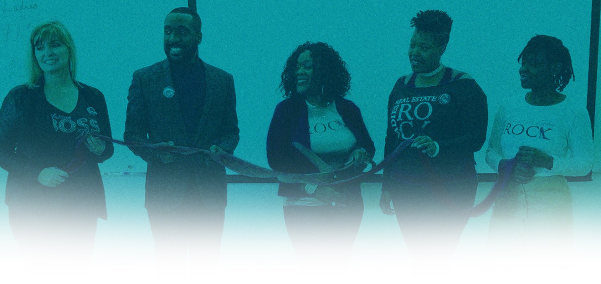 an abstract photo of a curved building with a blue sky in the background