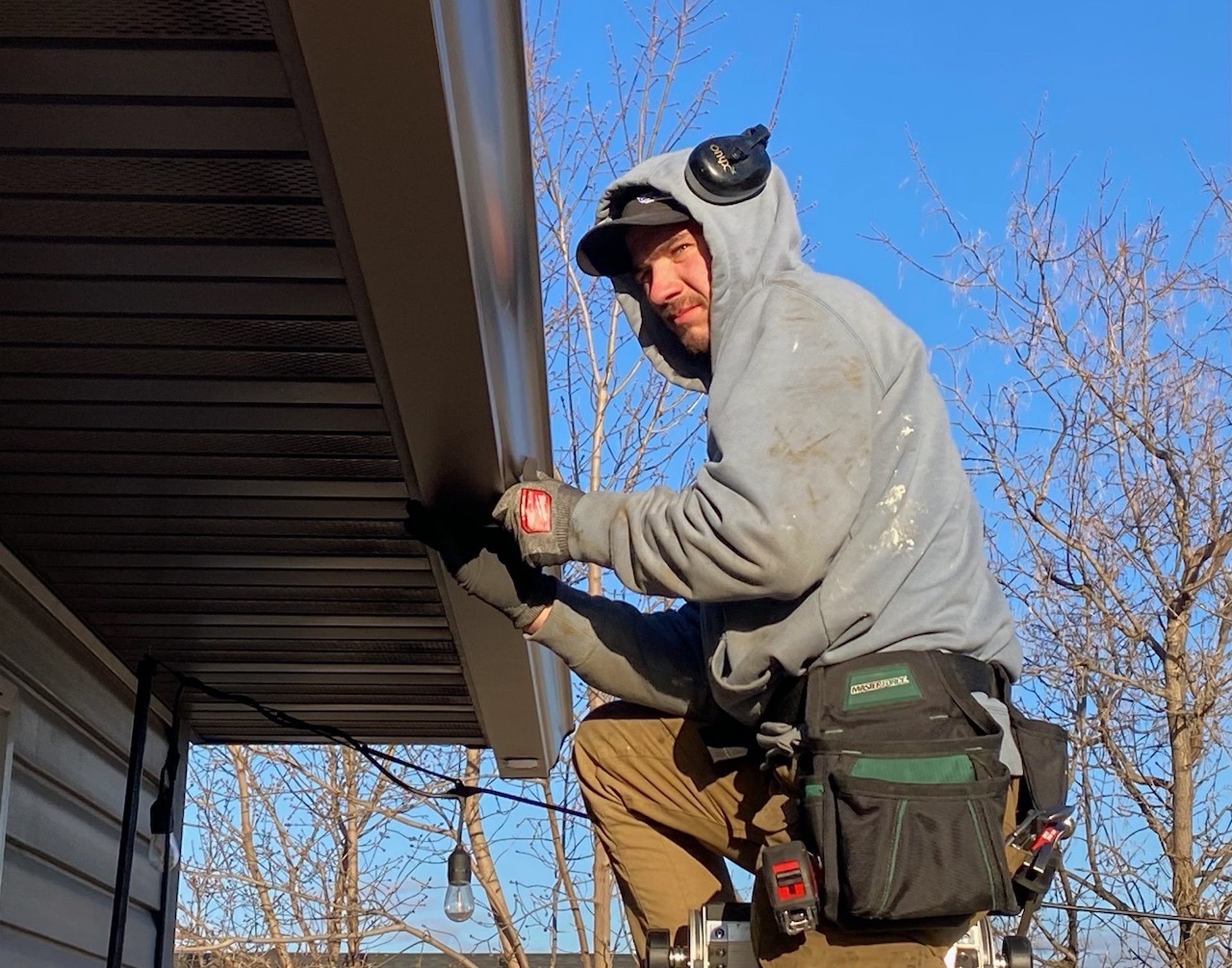 black and brown leather padded tub sofa