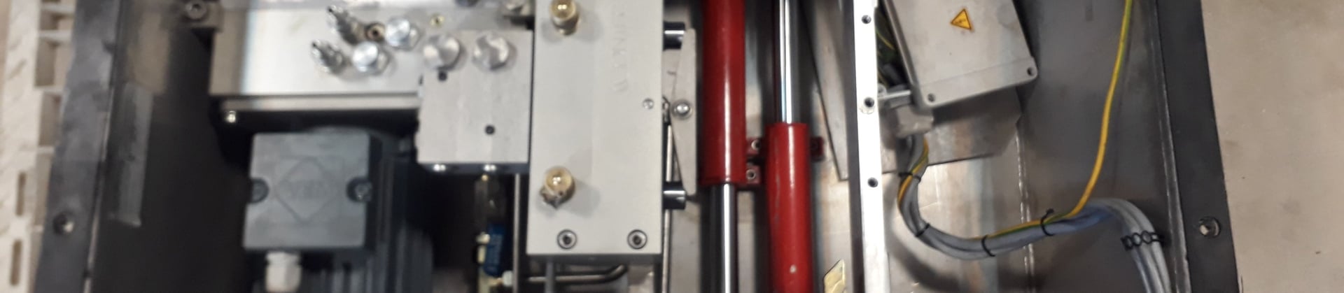 an abstract photo of a curved building with a blue sky in the background