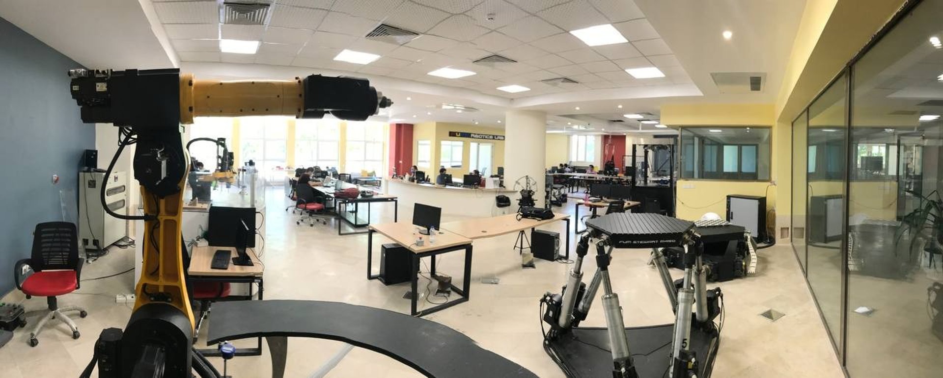 an abstract photo of a curved building with a blue sky in the background