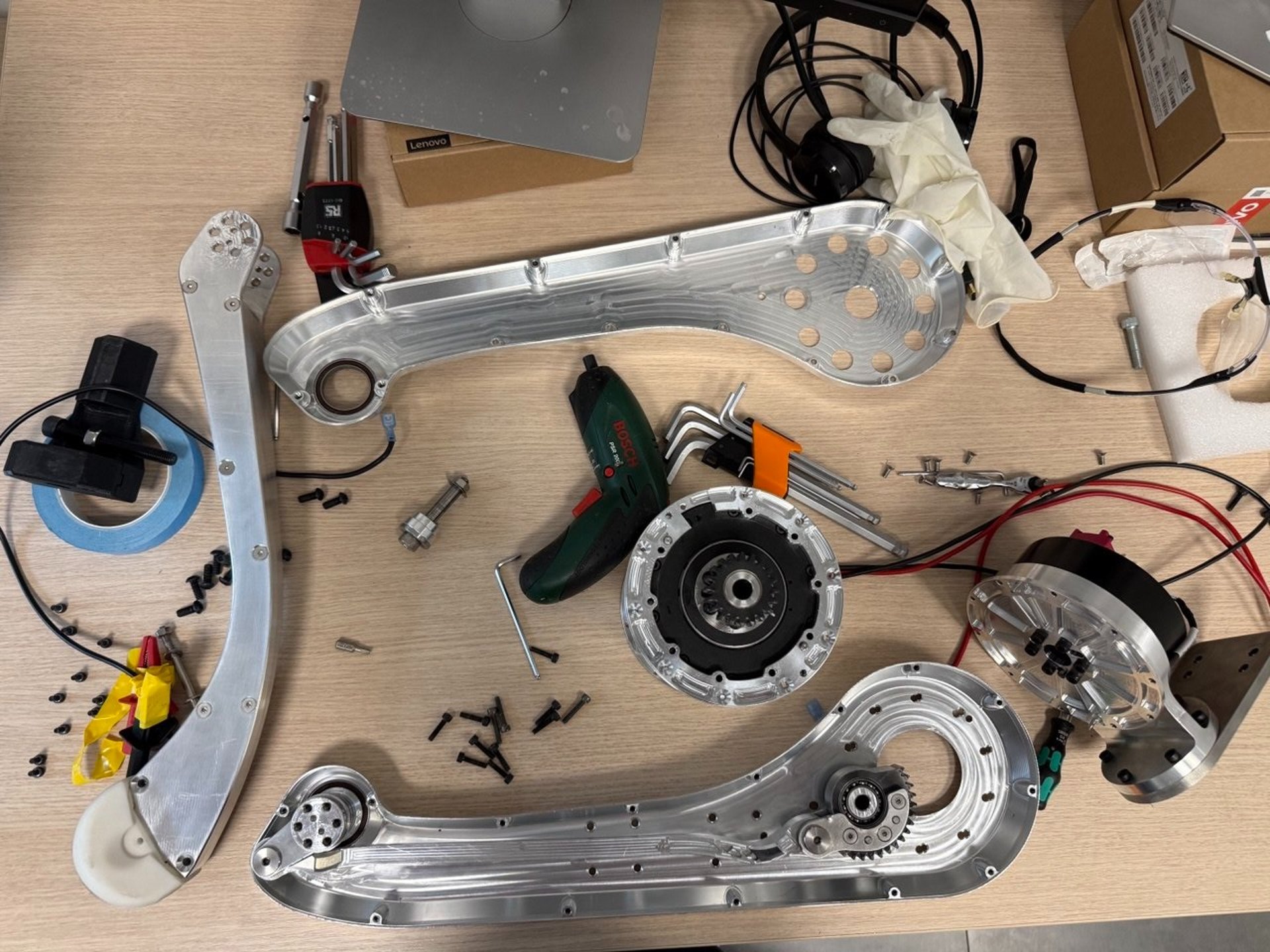 an abstract photo of a curved building with a blue sky in the background