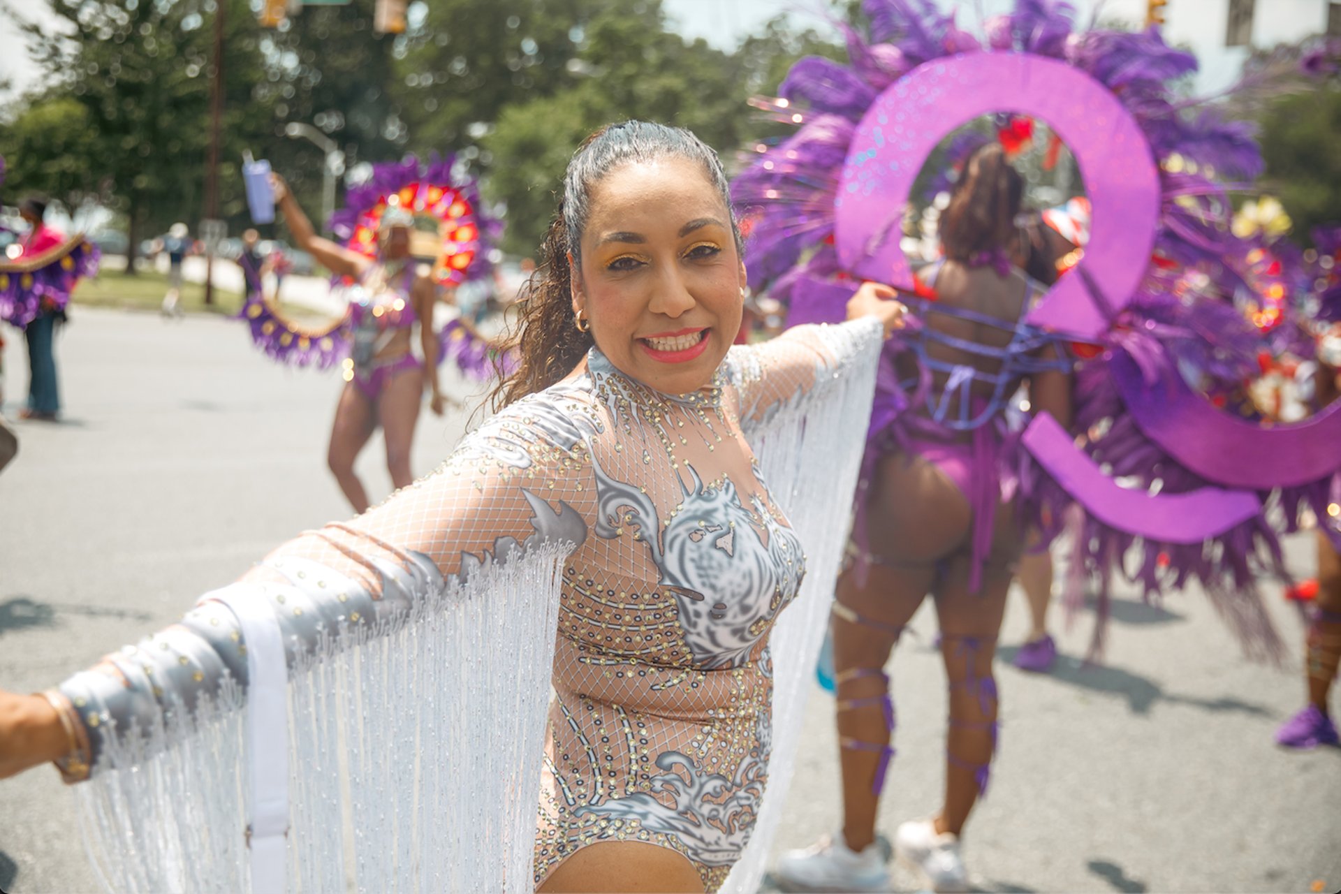 an abstract photo of a curved building with a blue sky in the background