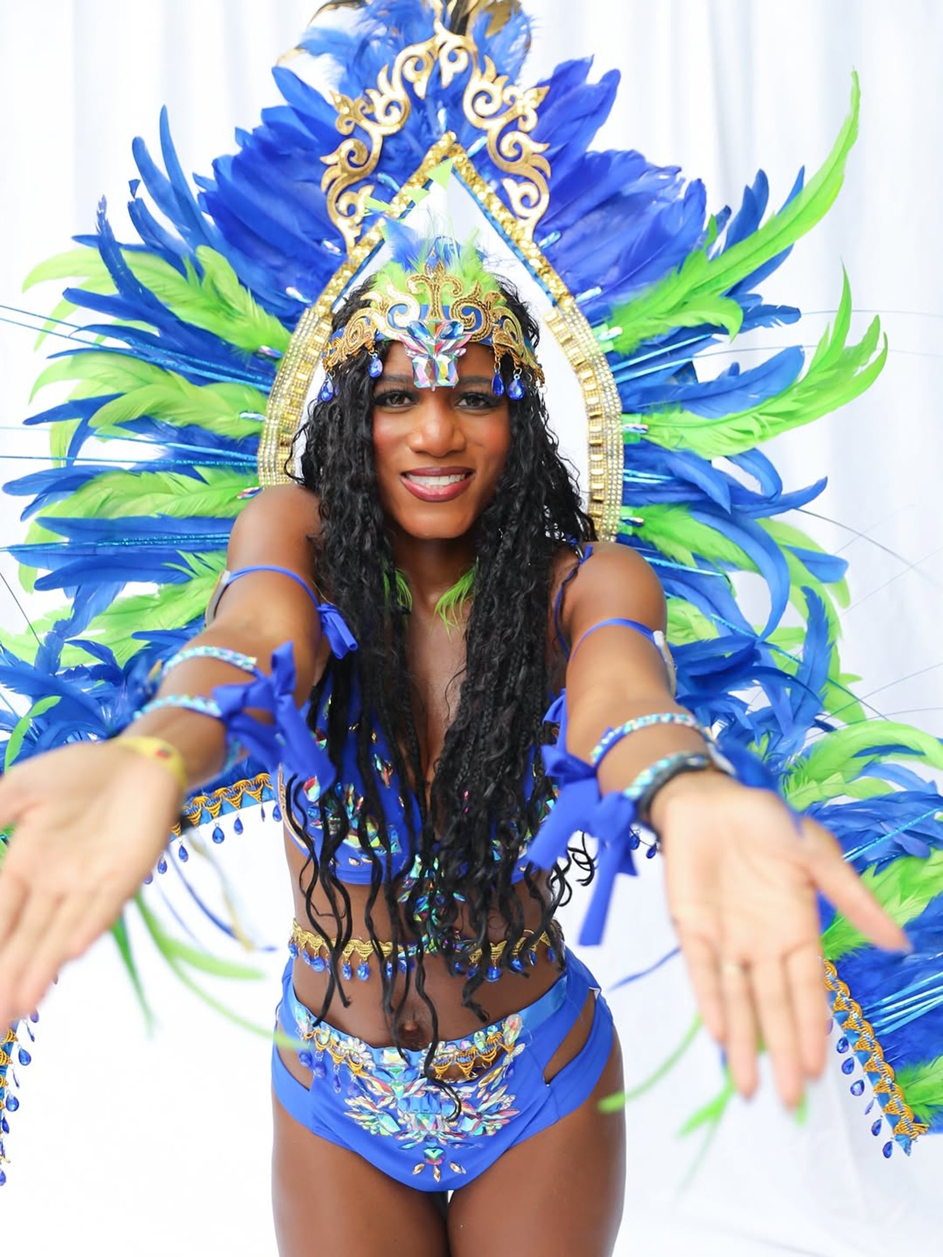 an abstract photo of a curved building with a blue sky in the background