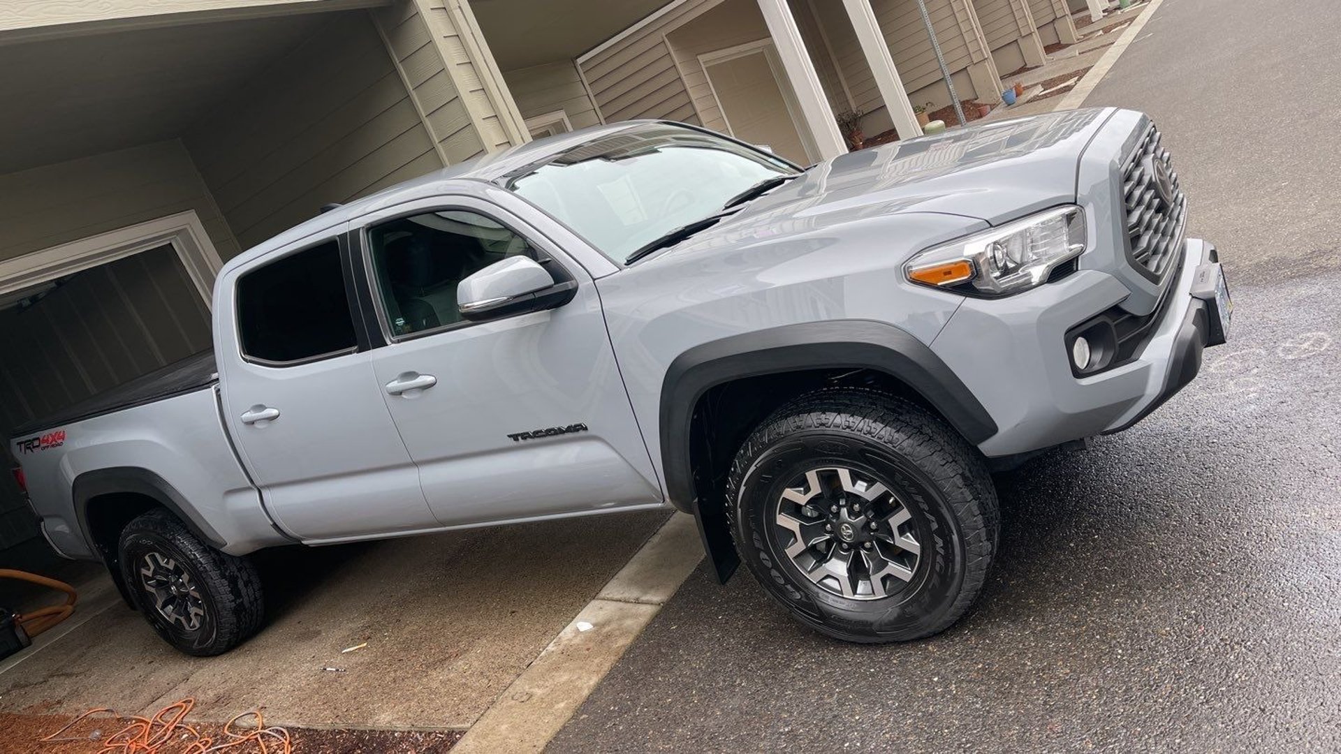 woman wearing yellow long-sleeved dress under white clouds and blue sky during daytime
