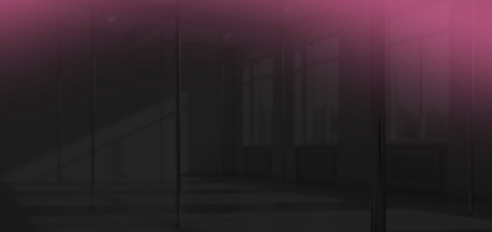 an abstract photo of a curved building with a blue sky in the background