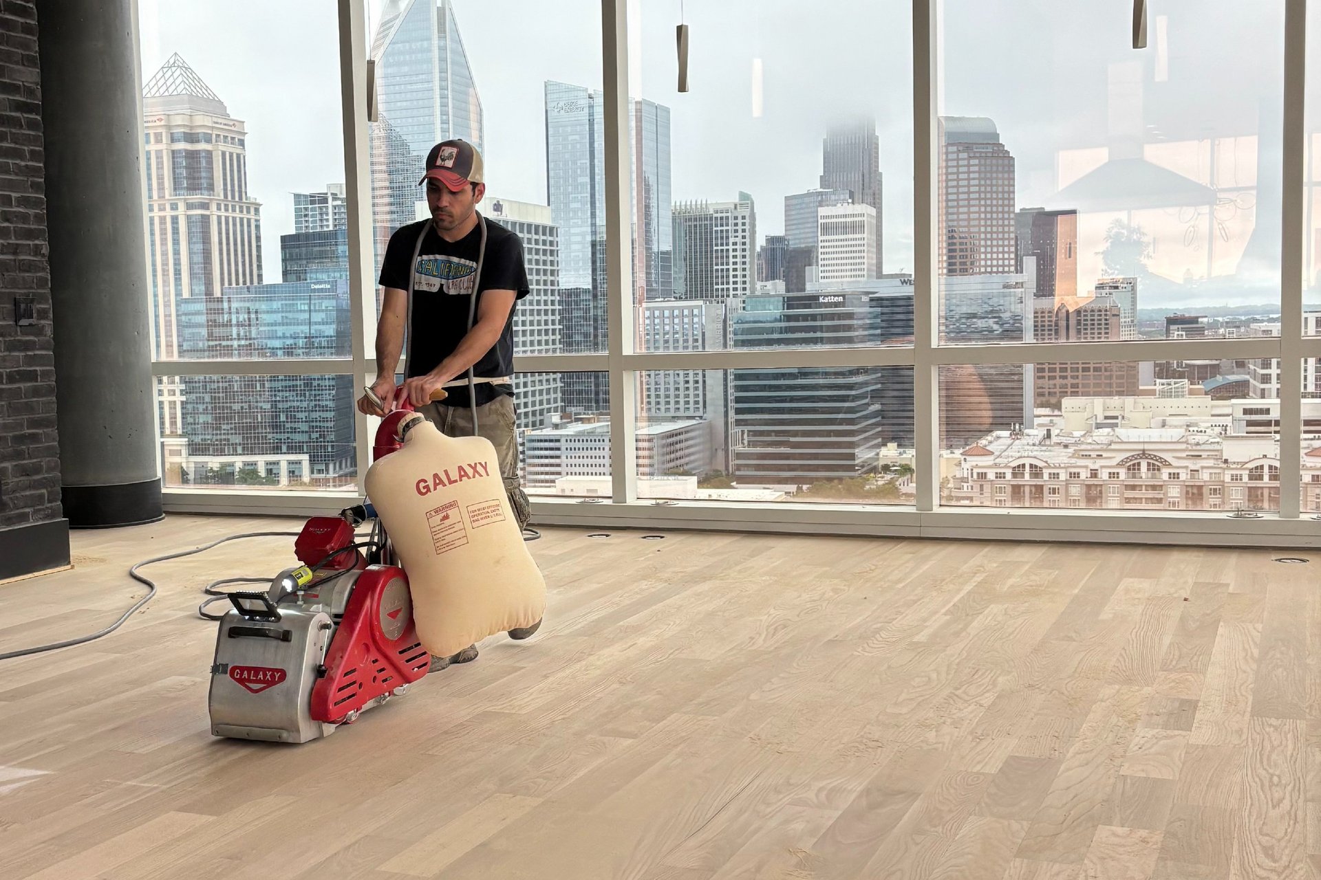 a man working on a piece of wood