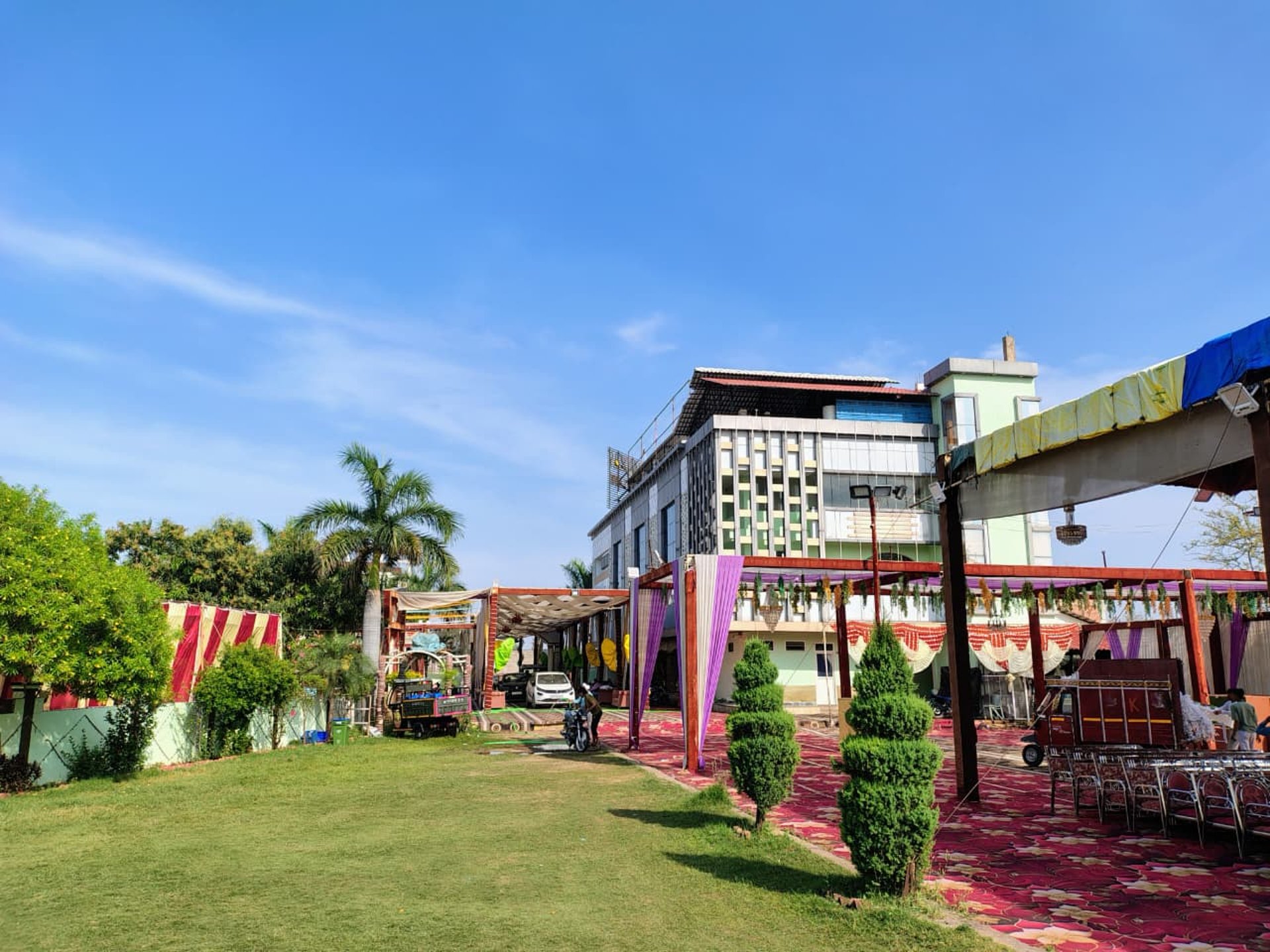 woman wearing yellow long-sleeved dress under white clouds and blue sky during daytime