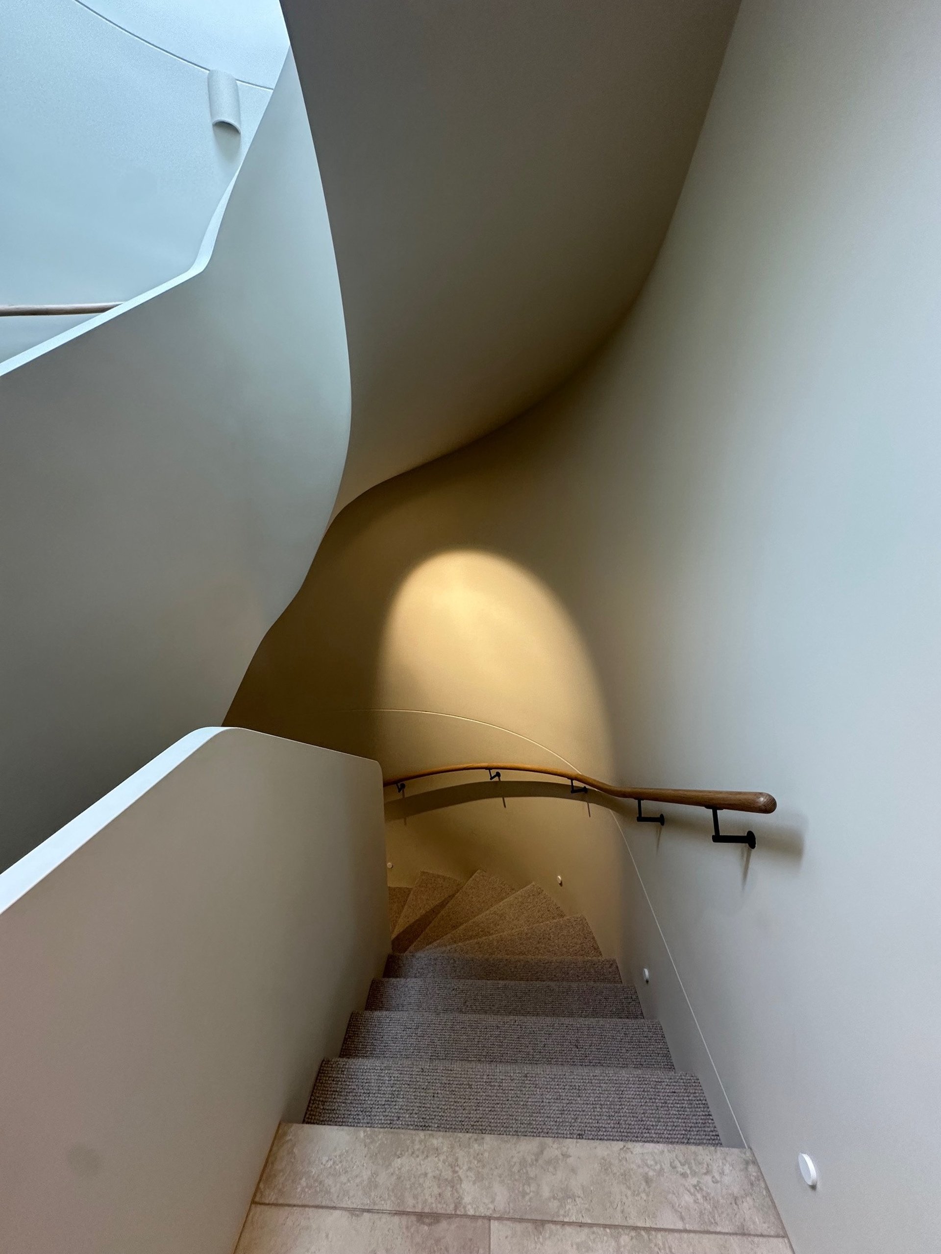 woman wearing yellow long-sleeved dress under white clouds and blue sky during daytime