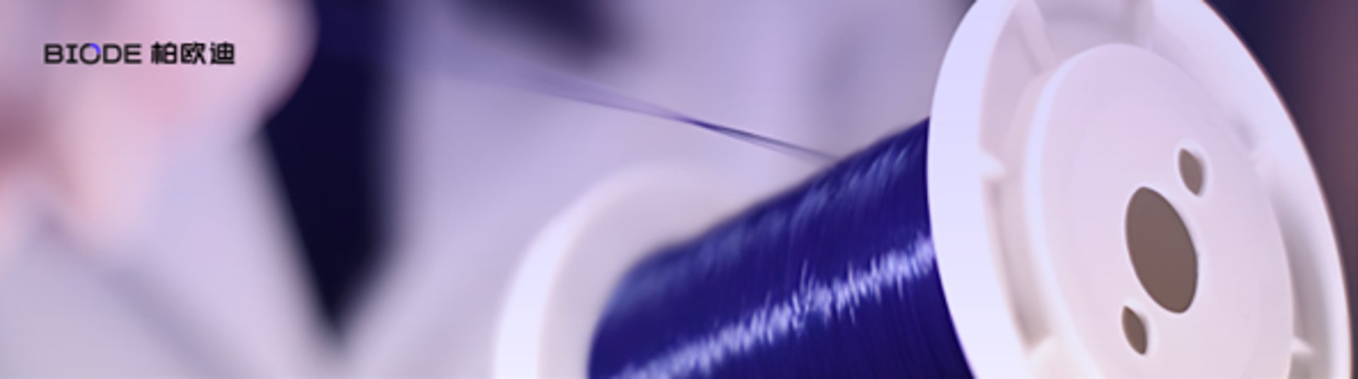 an abstract photo of a curved building with a blue sky in the background