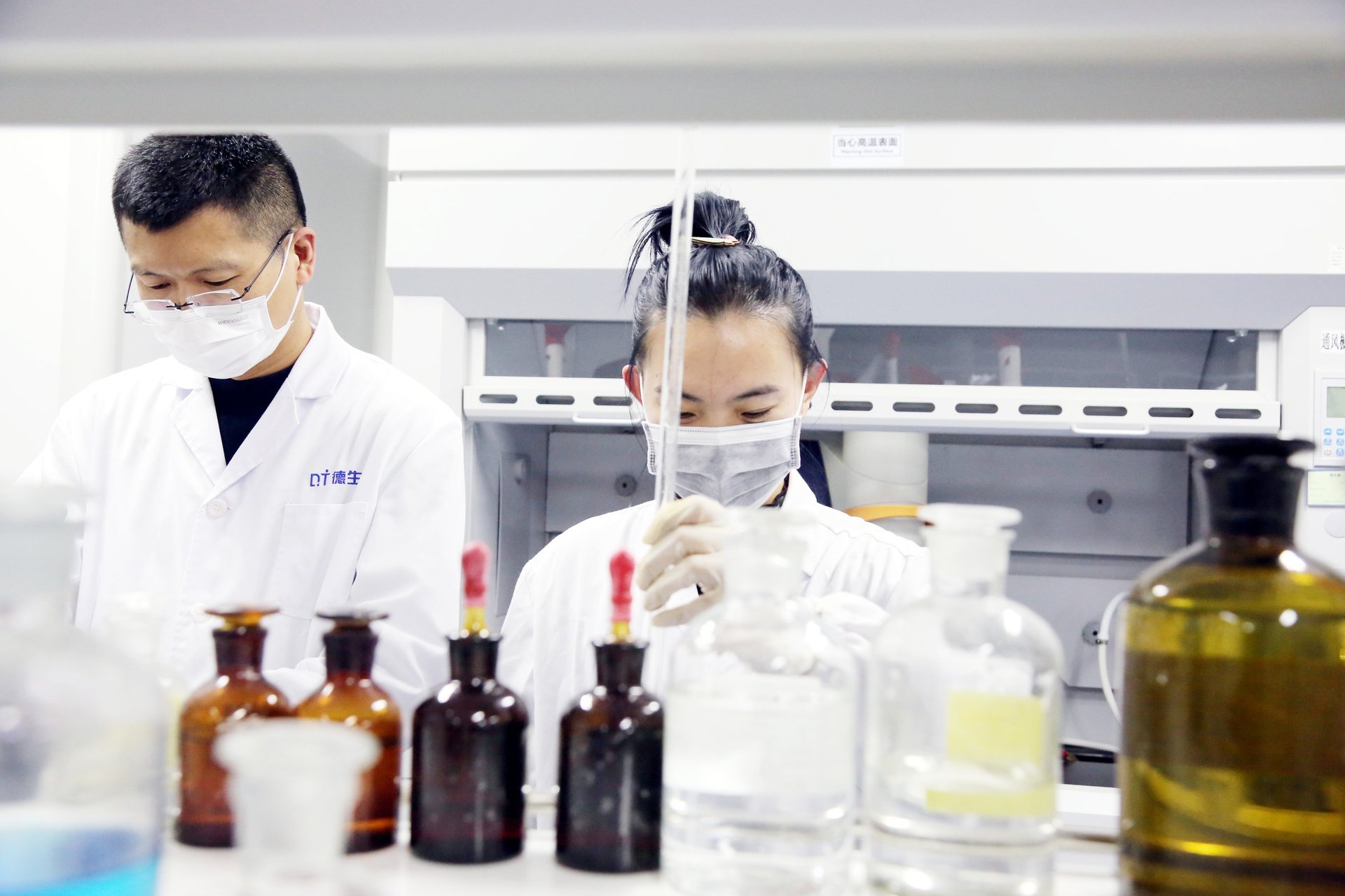 an abstract photo of a curved building with a blue sky in the background