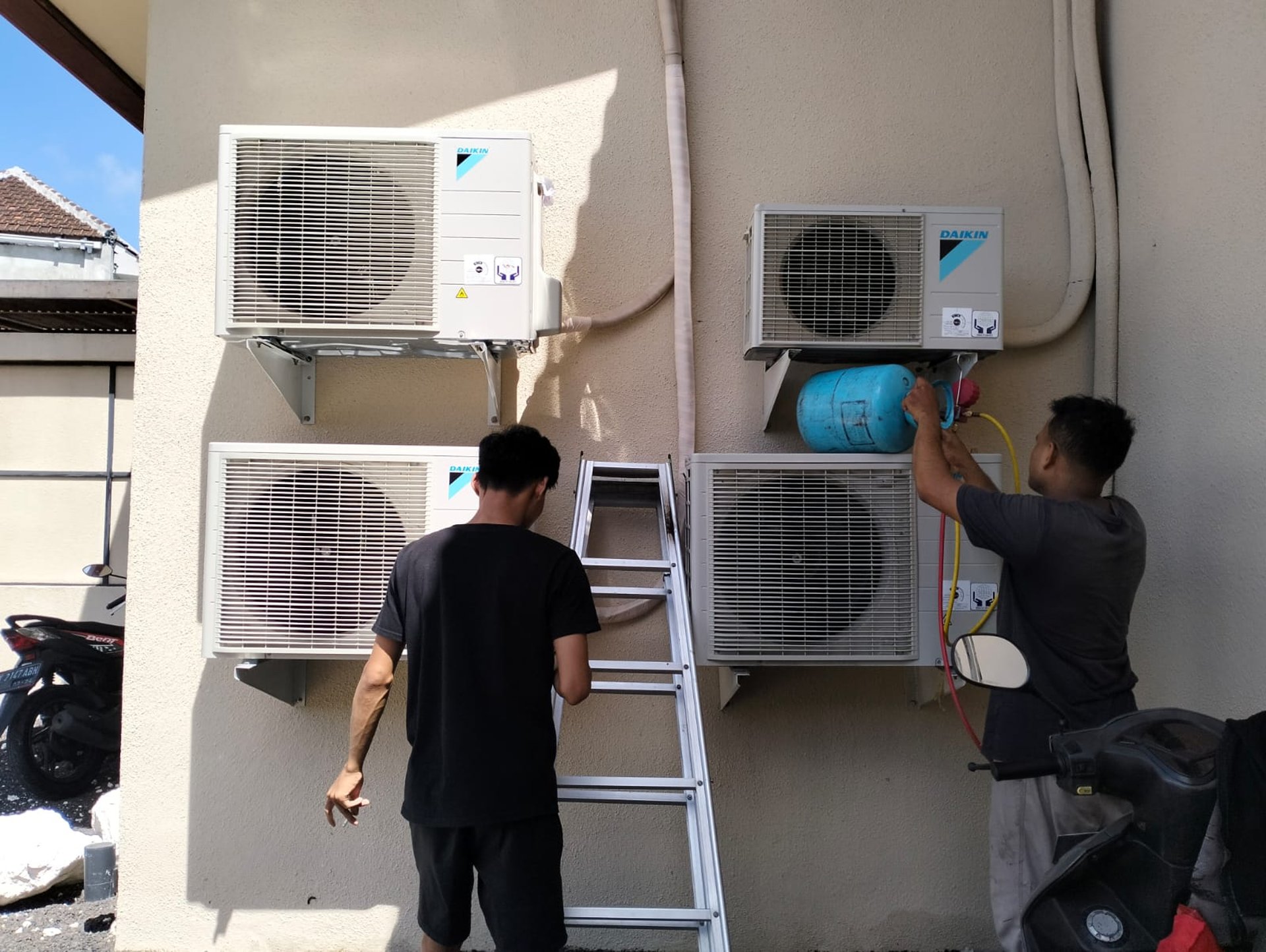 woman wearing yellow long-sleeved dress under white clouds and blue sky during daytime
