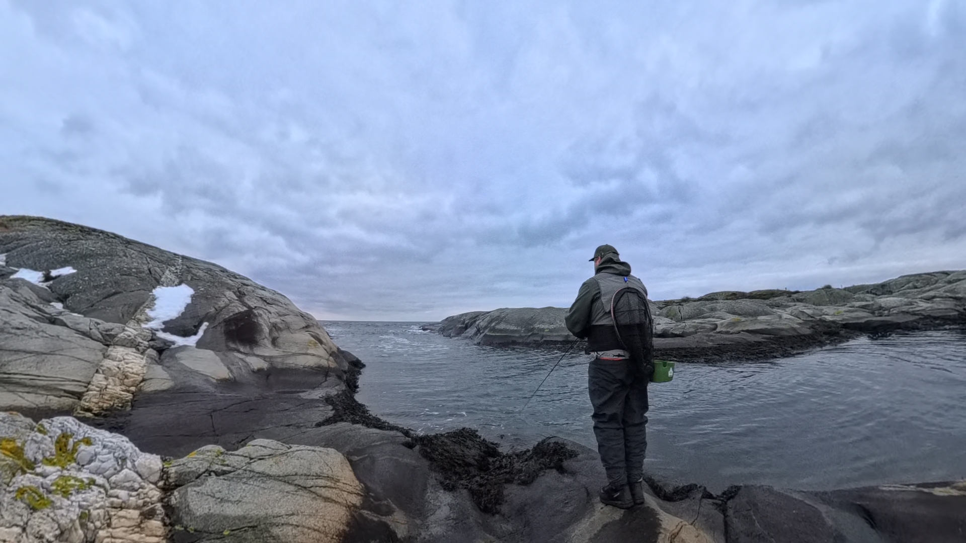 an abstract photo of a curved building with a blue sky in the background