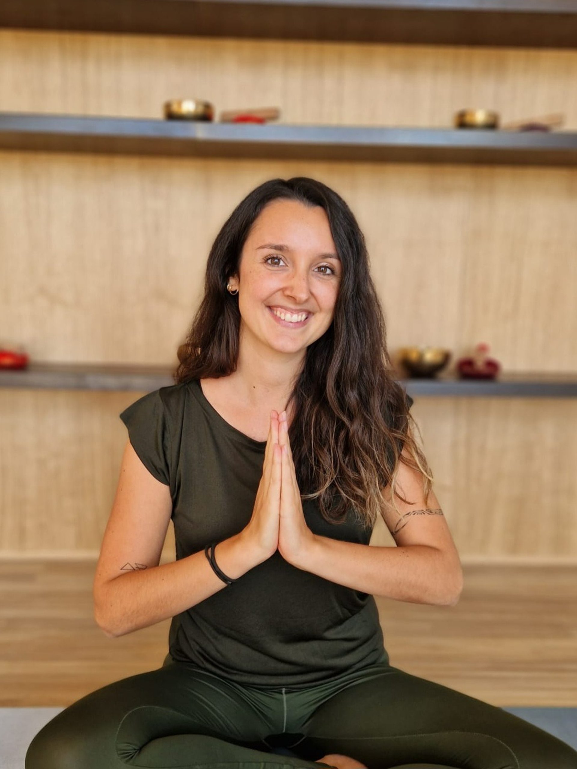 an abstract photo of a curved building with a blue sky in the background