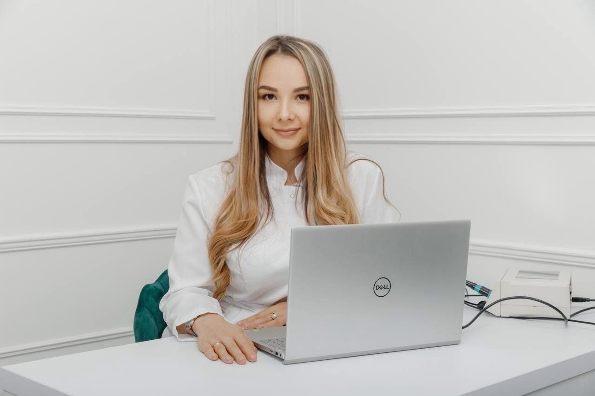 woman wearing yellow long-sleeved dress under white clouds and blue sky during daytime
