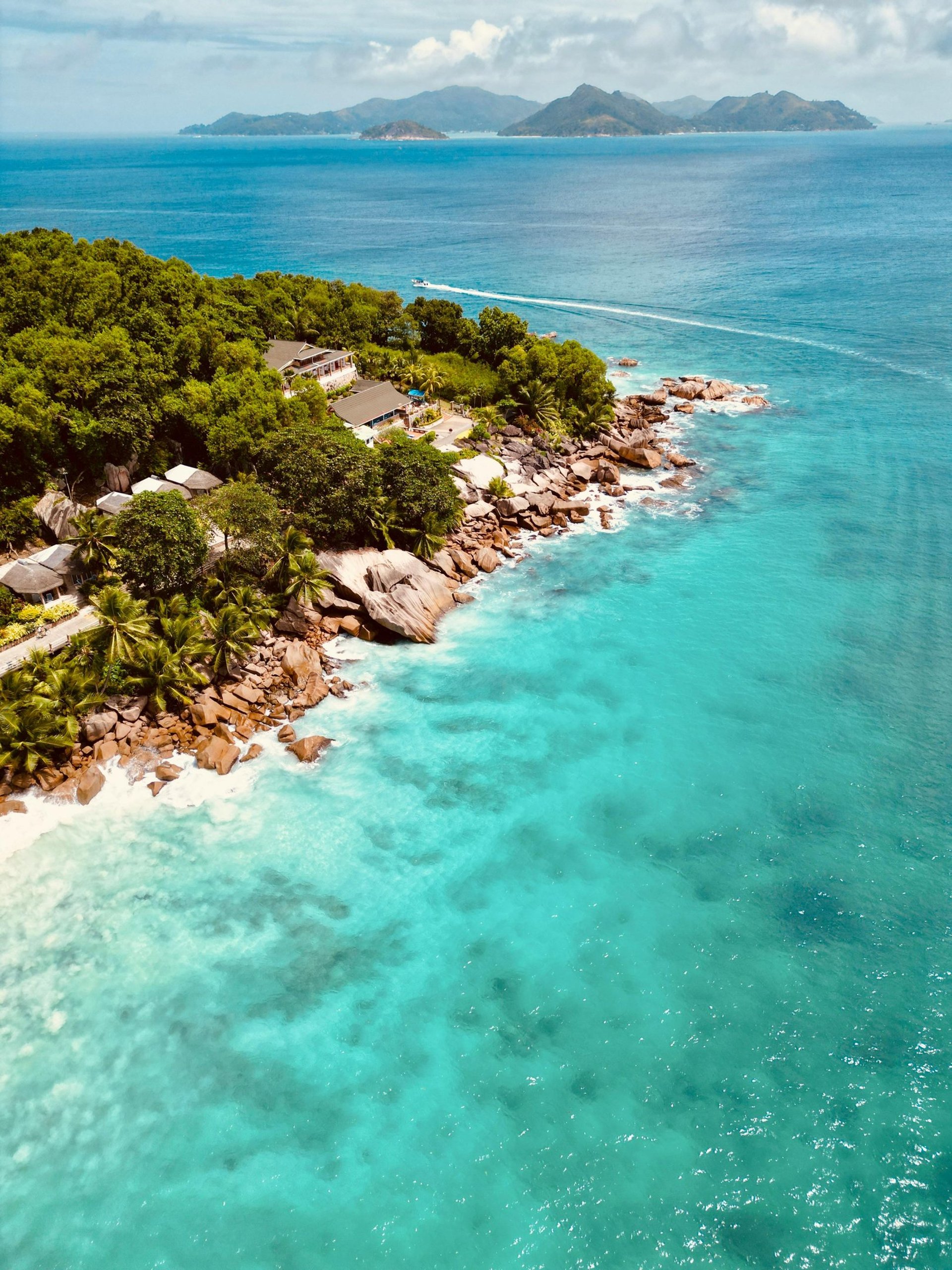 Seychelles tropical beach with turquoise water and granite rocks