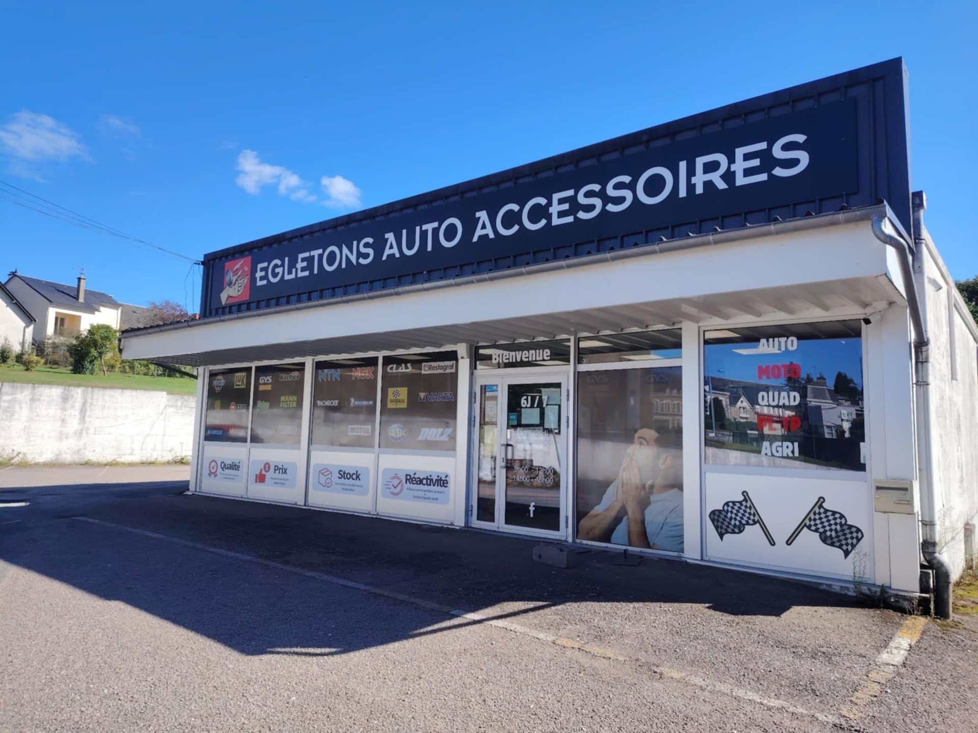 an abstract photo of a curved building with a blue sky in the background