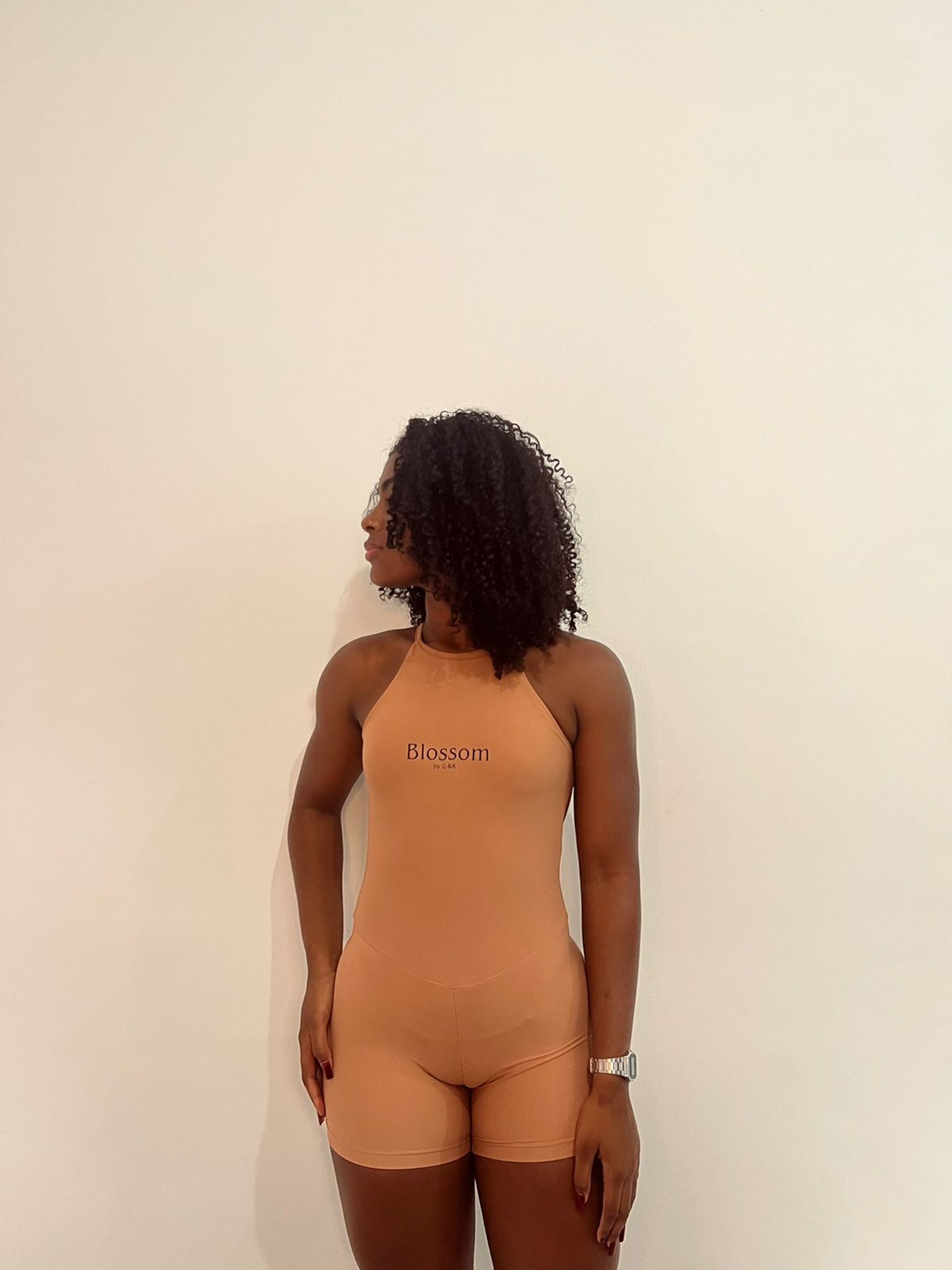 woman holding dried flower