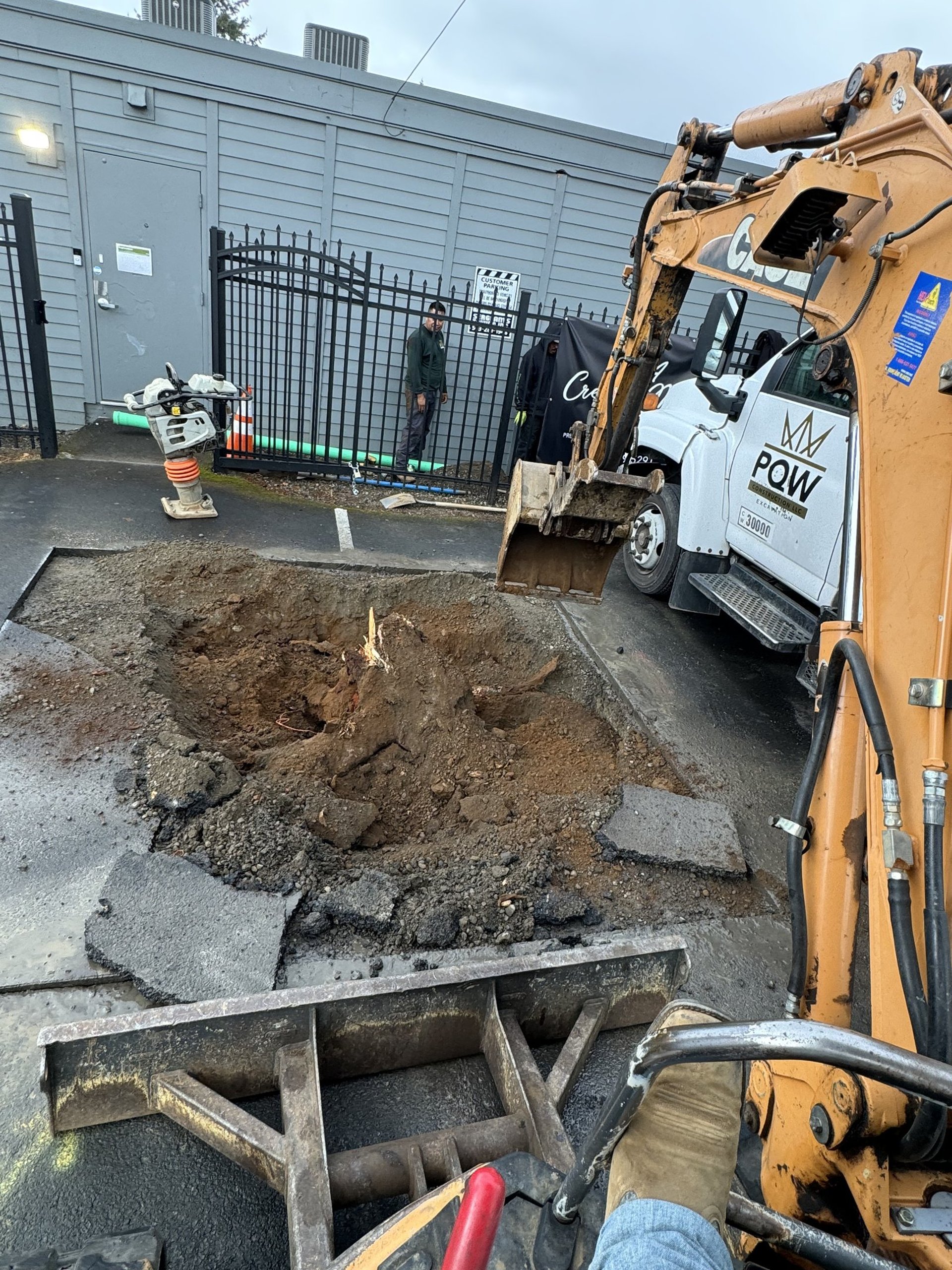 black and brown leather padded tub sofa