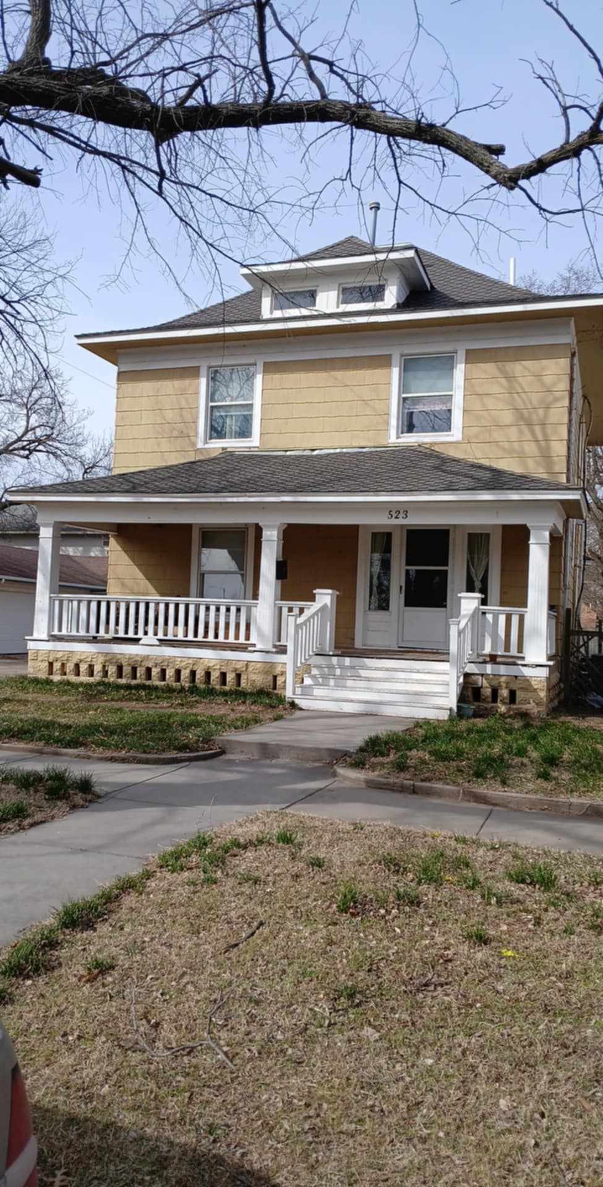 black and brown leather padded tub sofa
