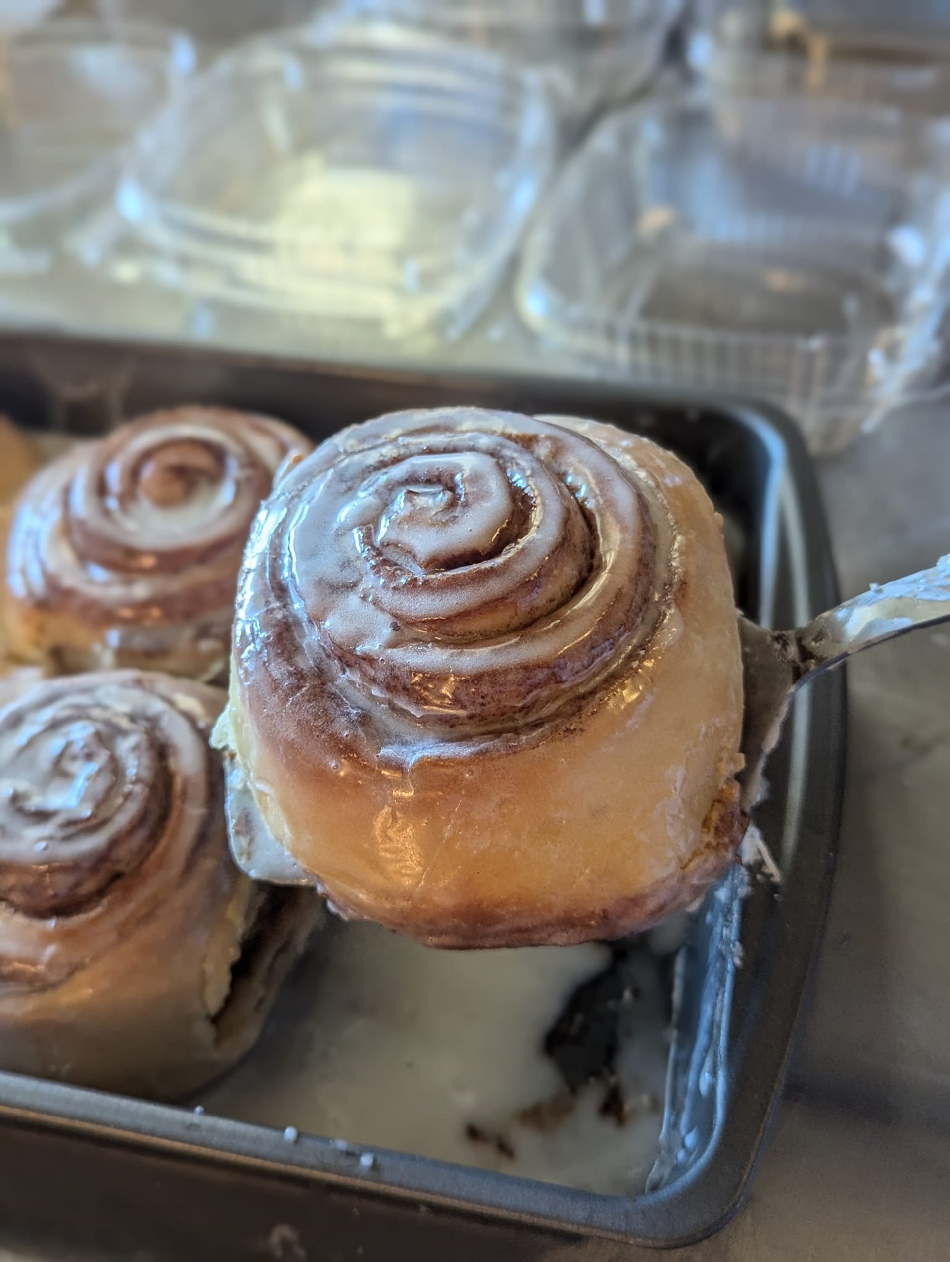 an abstract photo of a curved building with a blue sky in the background