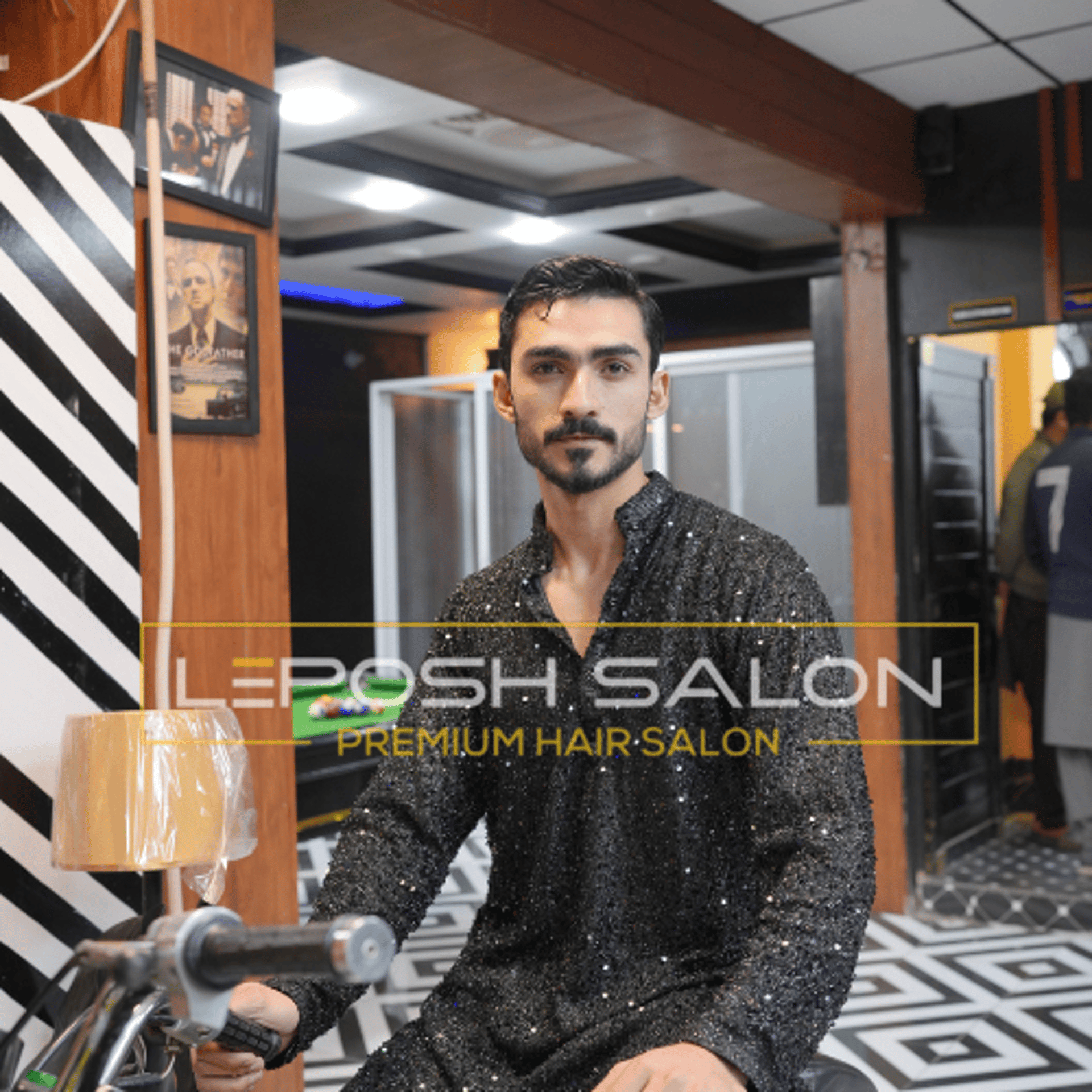 black and brown leather padded tub sofa