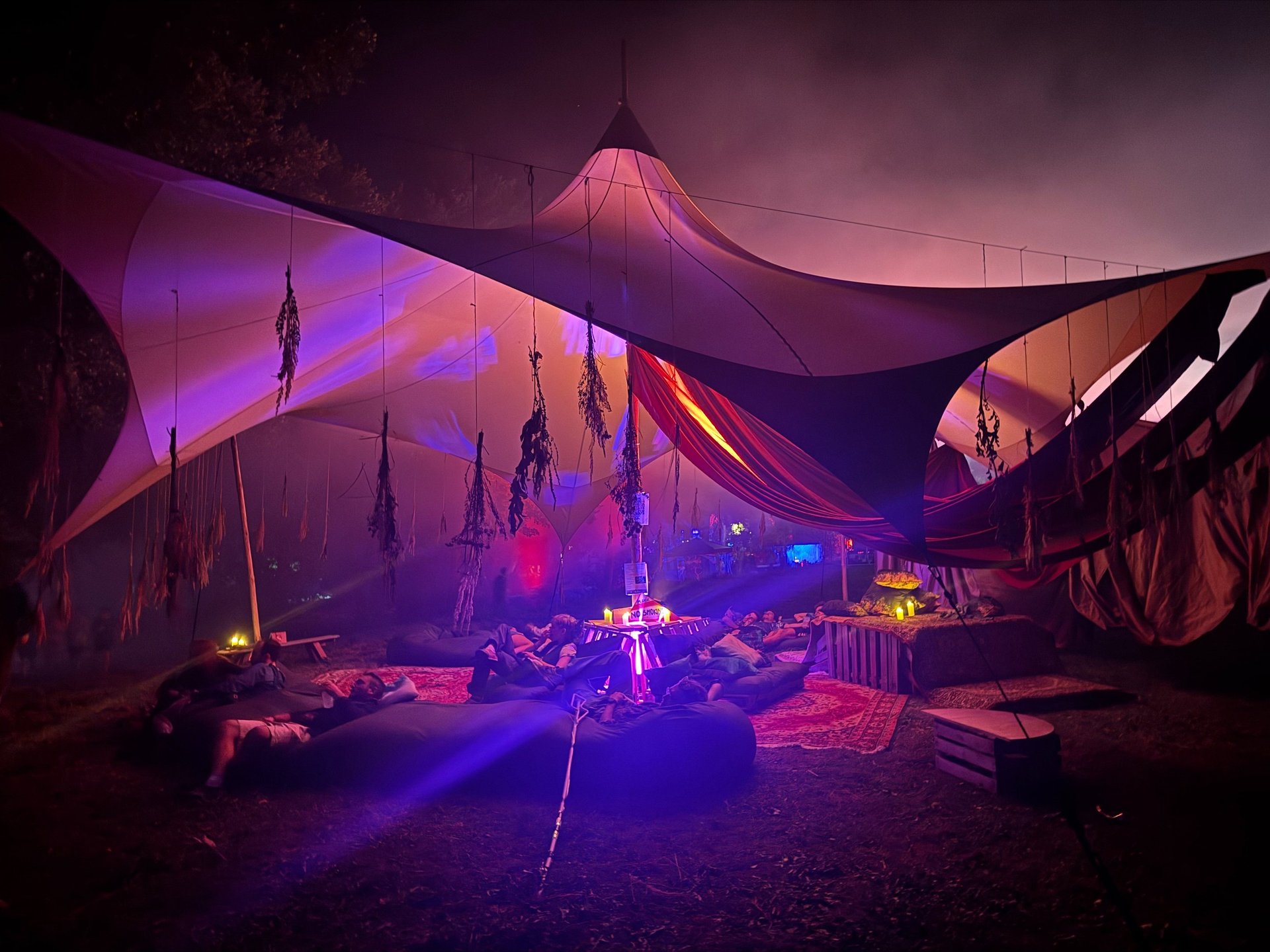 an abstract photo of a curved building with a blue sky in the background
