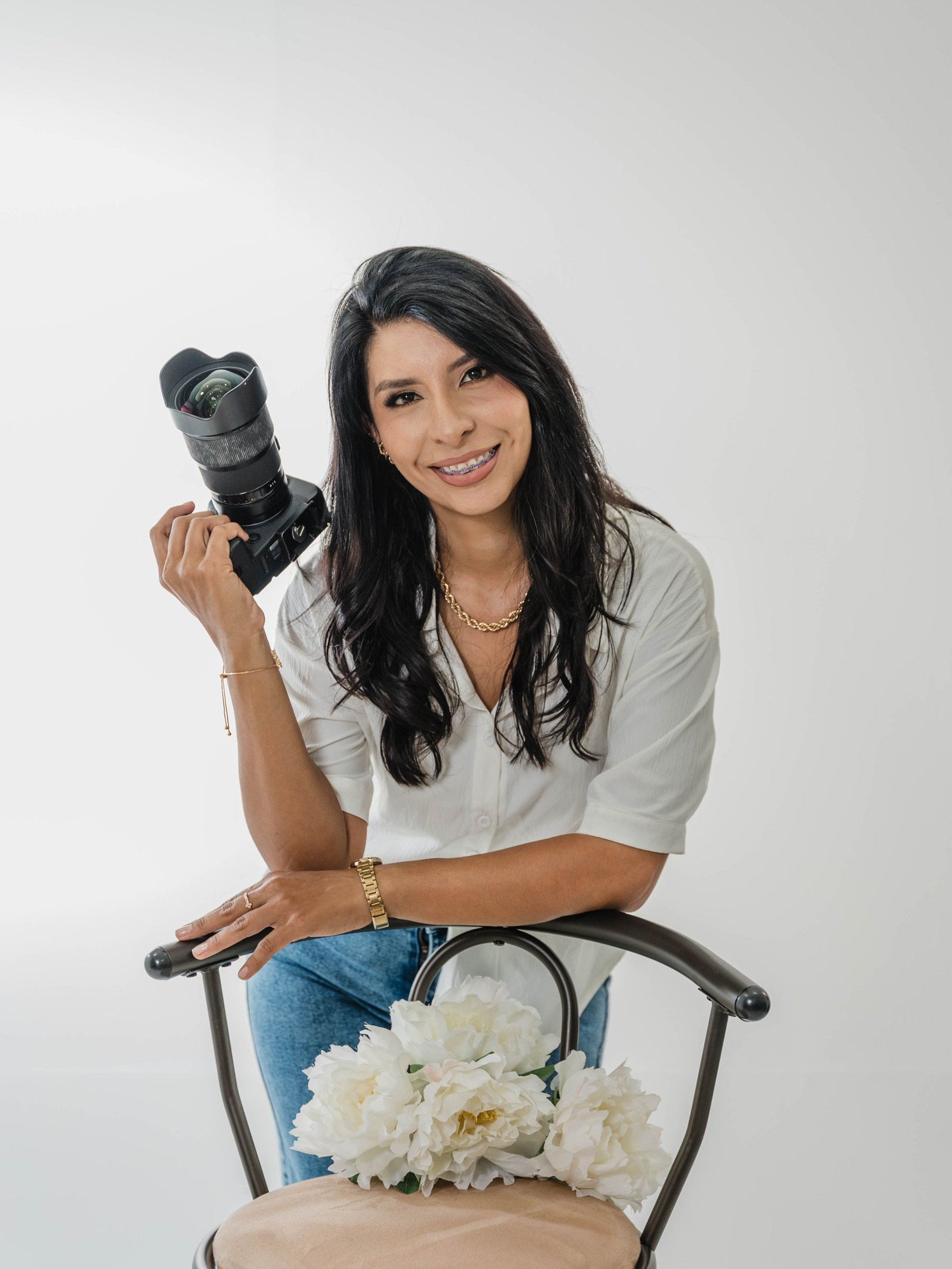 woman wearing yellow long-sleeved dress under white clouds and blue sky during daytime