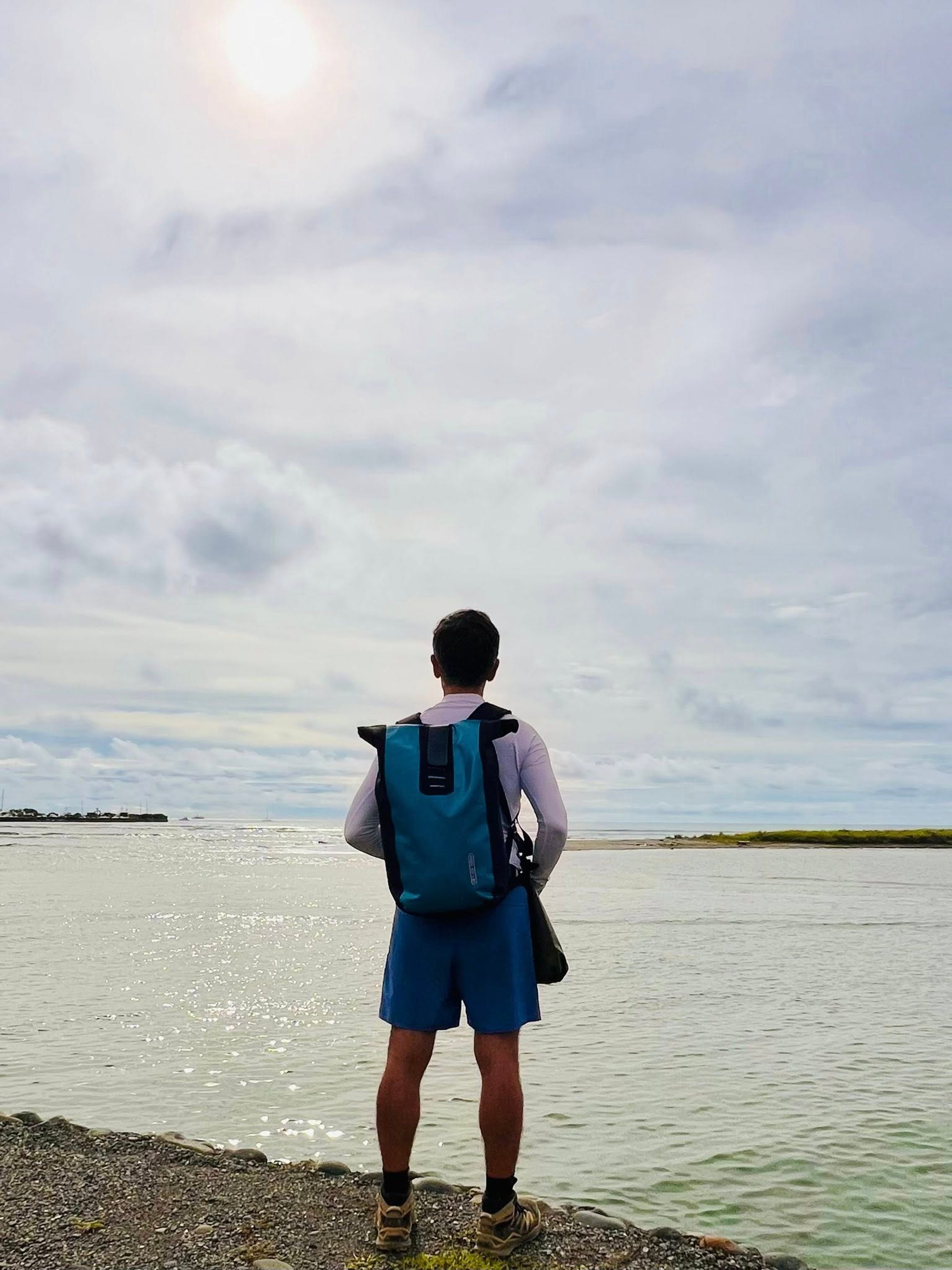 green mountain under blue sky and white clouds during daytime