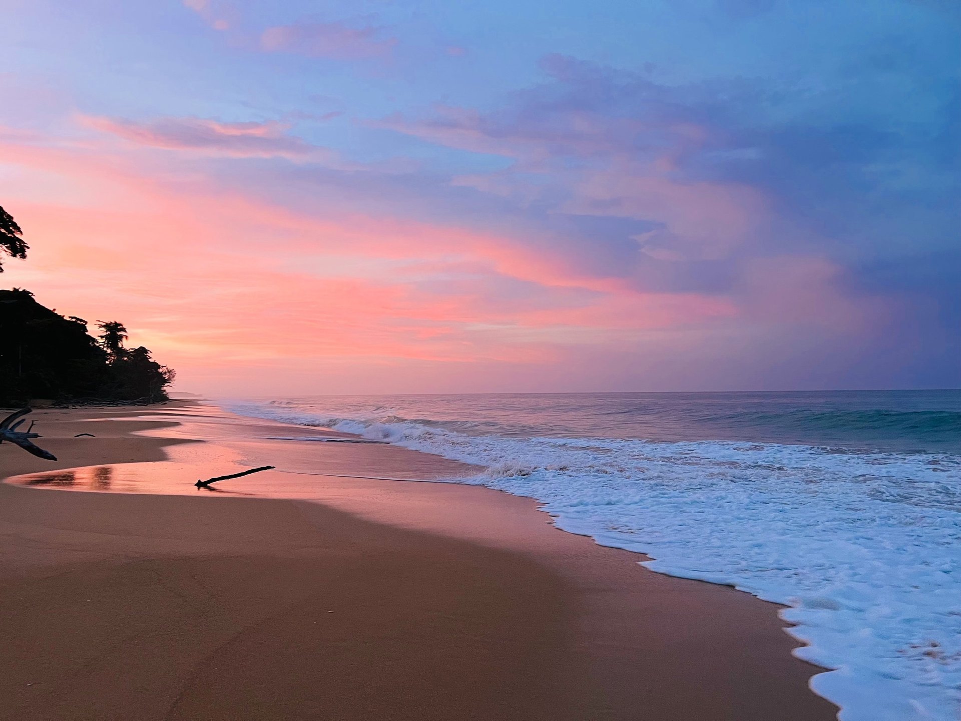 a boat floating on top of a body of water