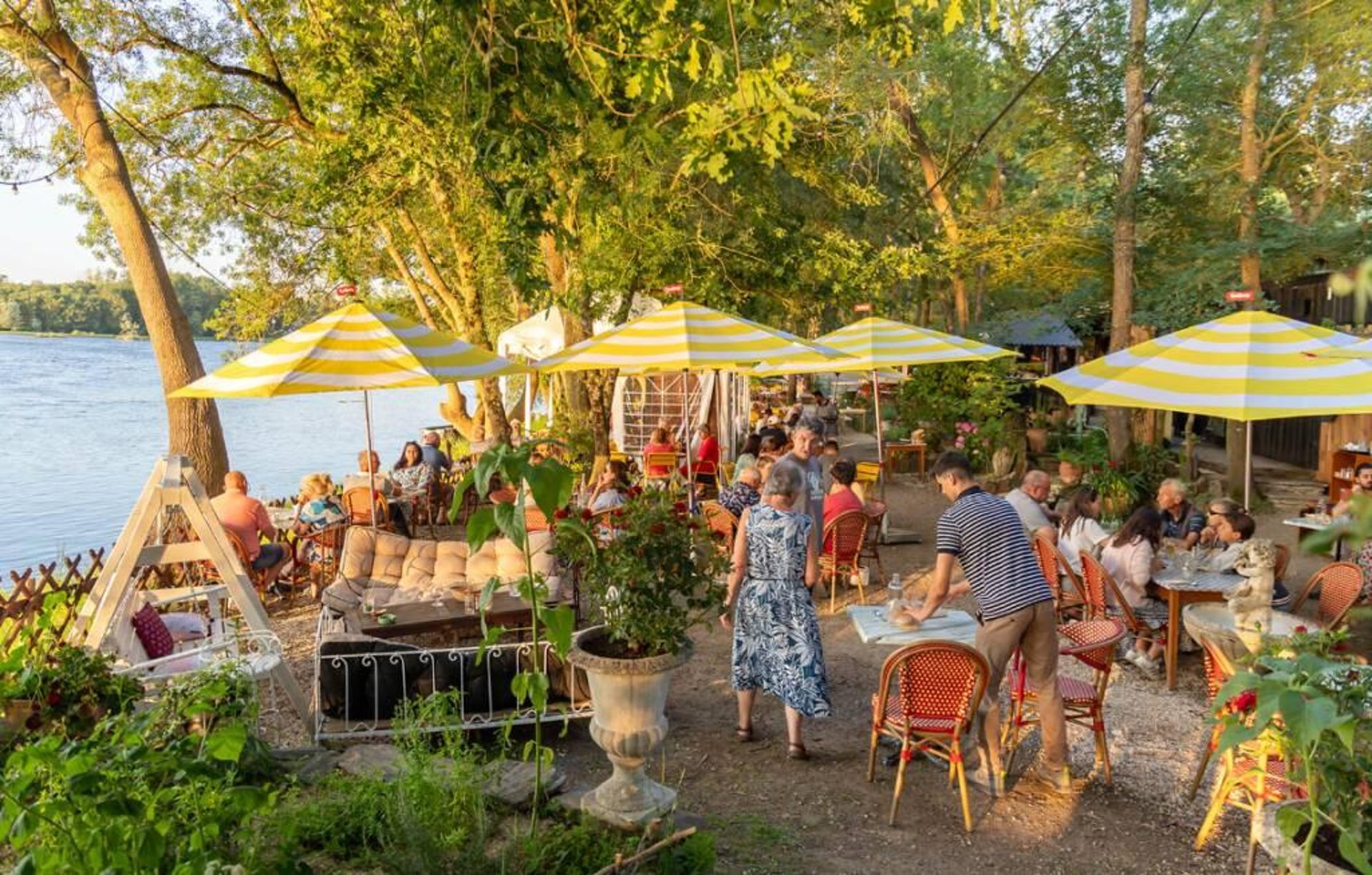 woman wearing yellow long-sleeved dress under white clouds and blue sky during daytime