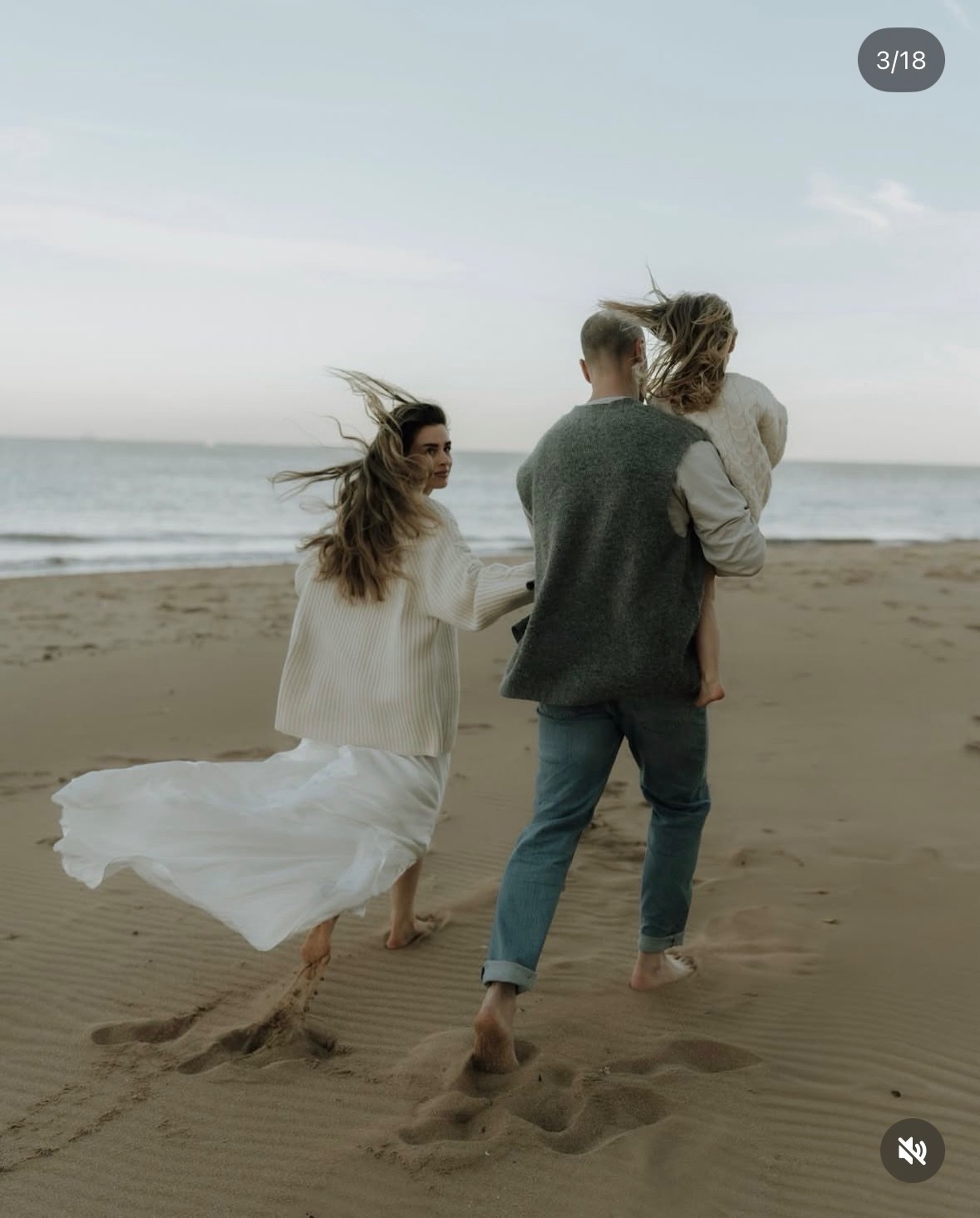 an abstract photo of a curved building with a blue sky in the background
