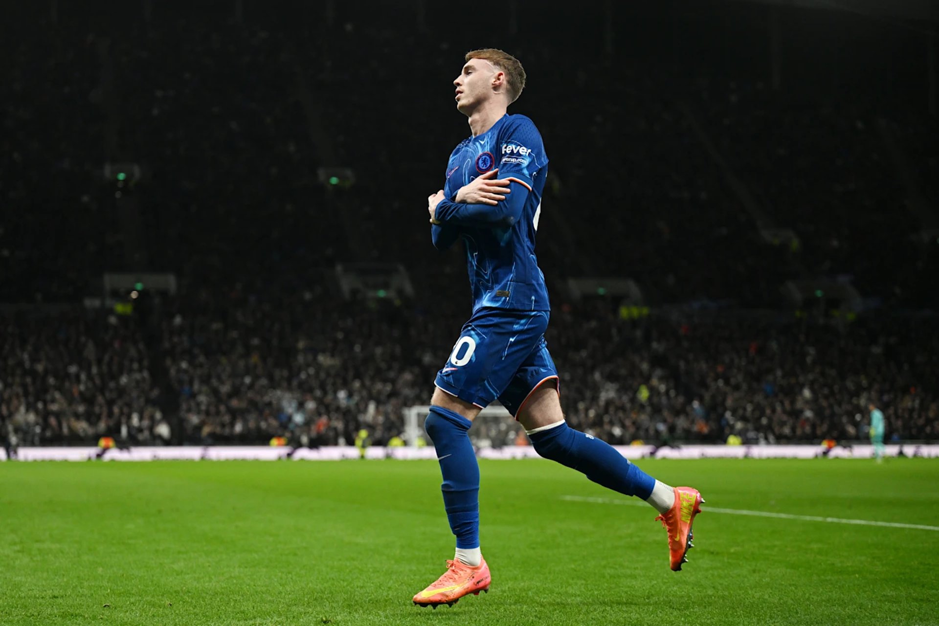 woman wearing yellow long-sleeved dress under white clouds and blue sky during daytime