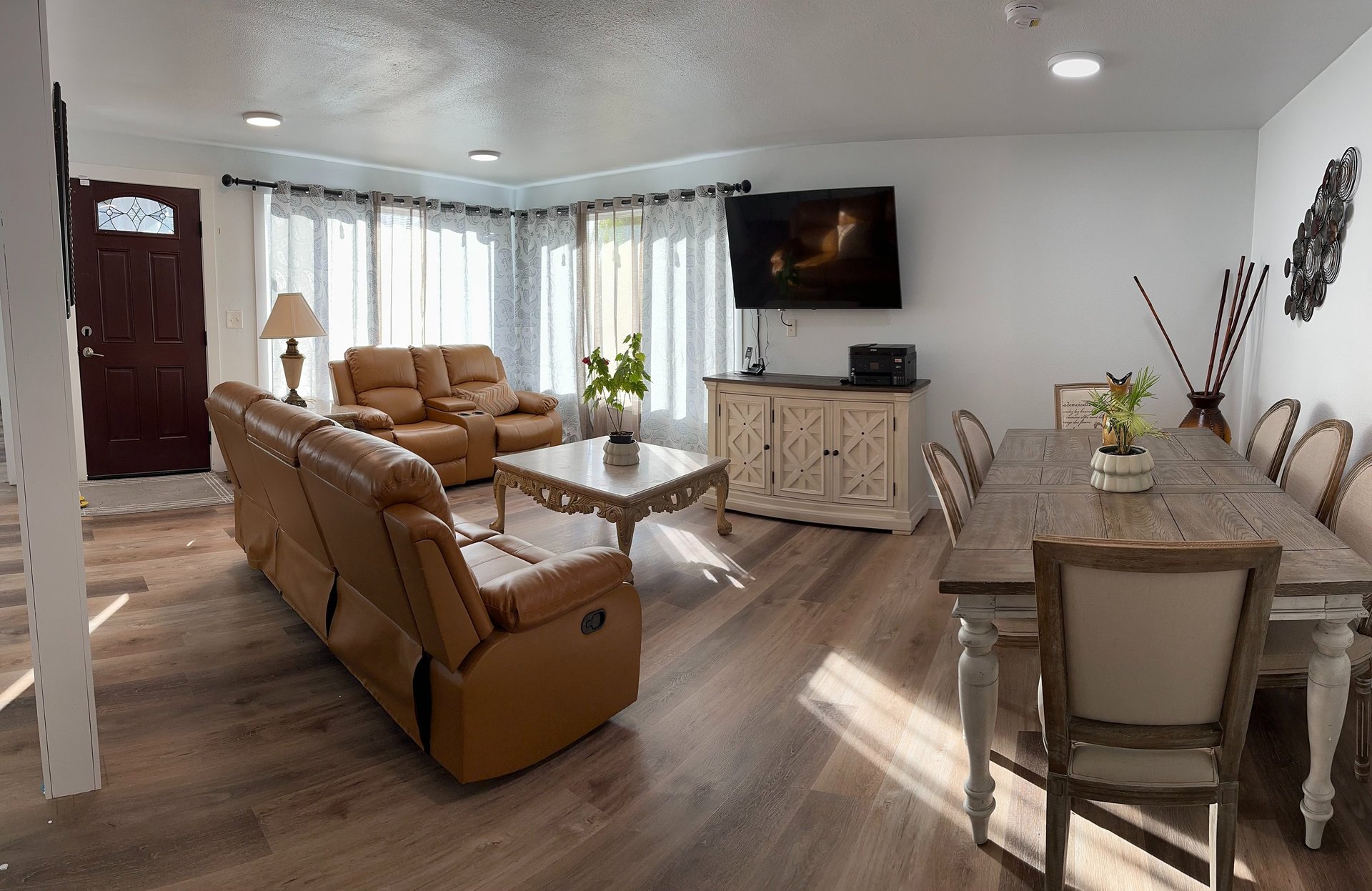 woman wearing yellow long-sleeved dress under white clouds and blue sky during daytime