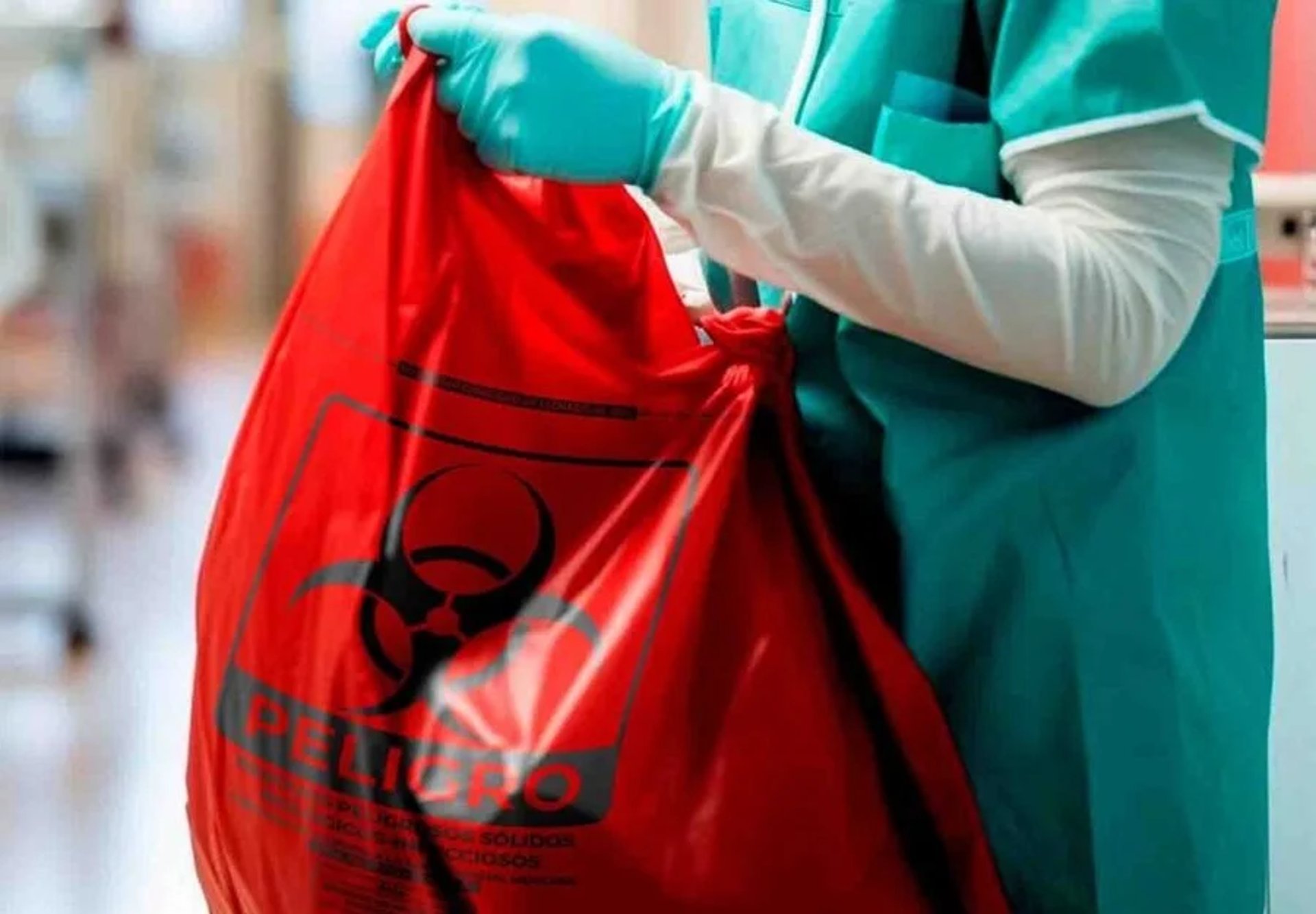 an abstract photo of a curved building with a blue sky in the background