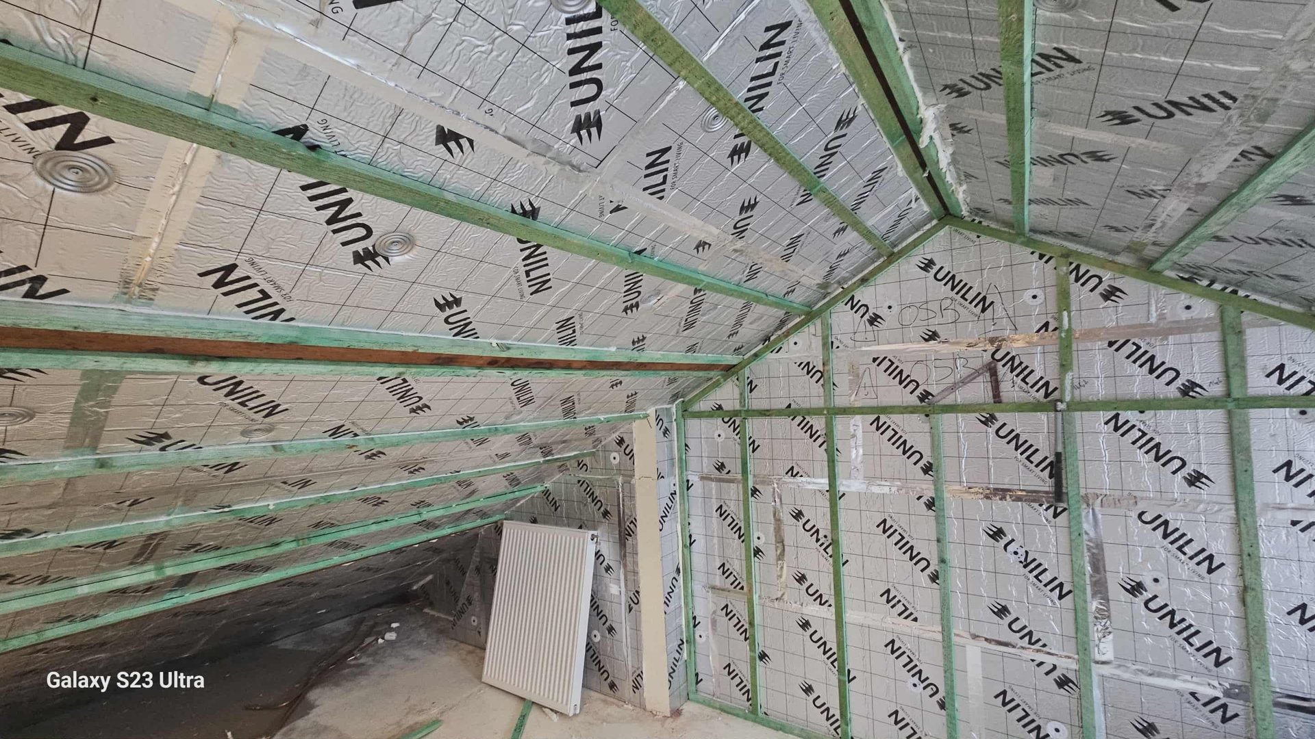 an abstract photo of a curved building with a blue sky in the background