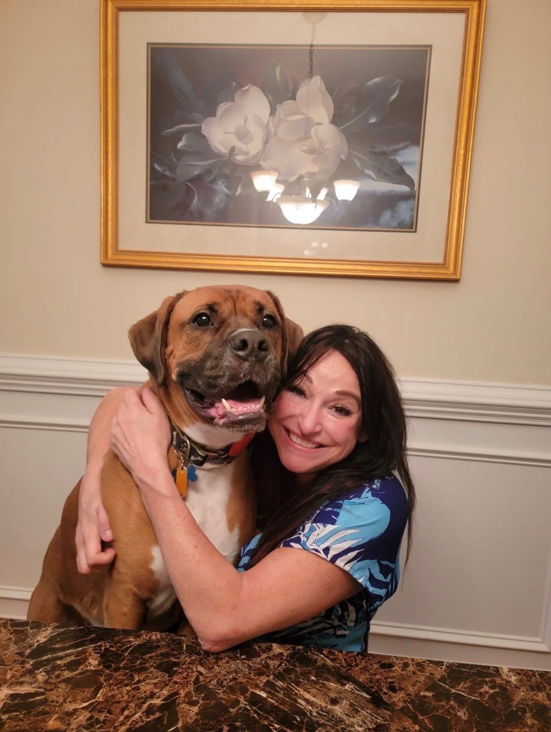 woman in black pants standing on window during daytime