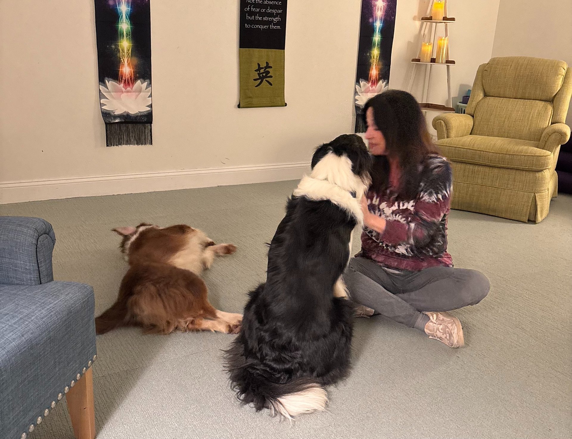 woman in black pants standing on window during daytime