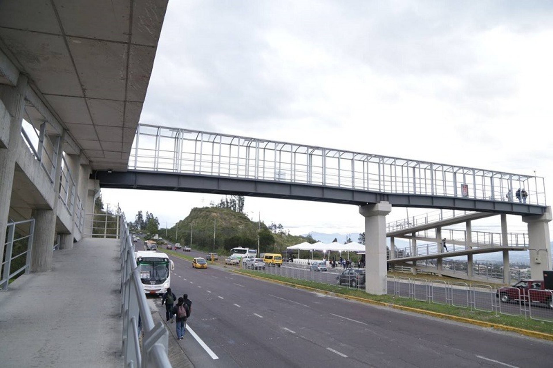 an abstract photo of a curved building with a blue sky in the background