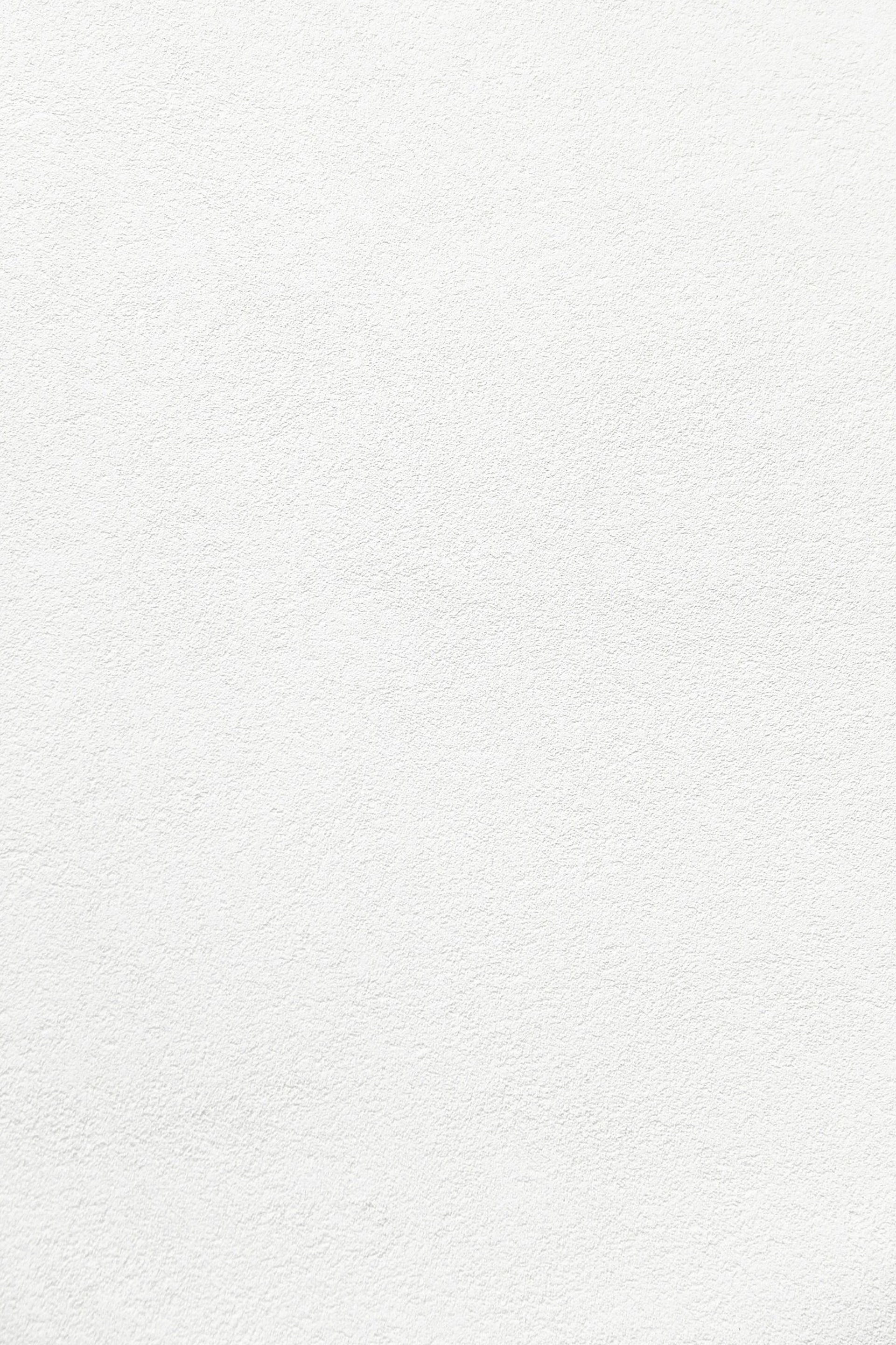 white textured paper or plaster surface