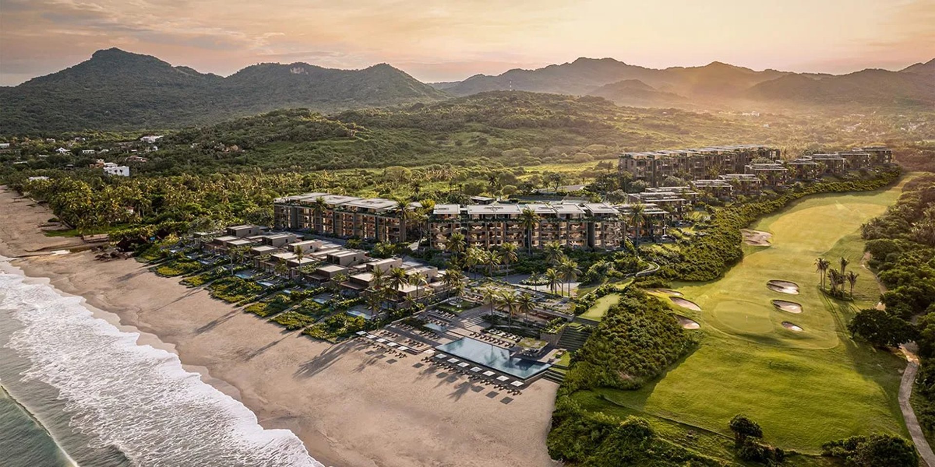 an abstract photo of a curved building with a blue sky in the background